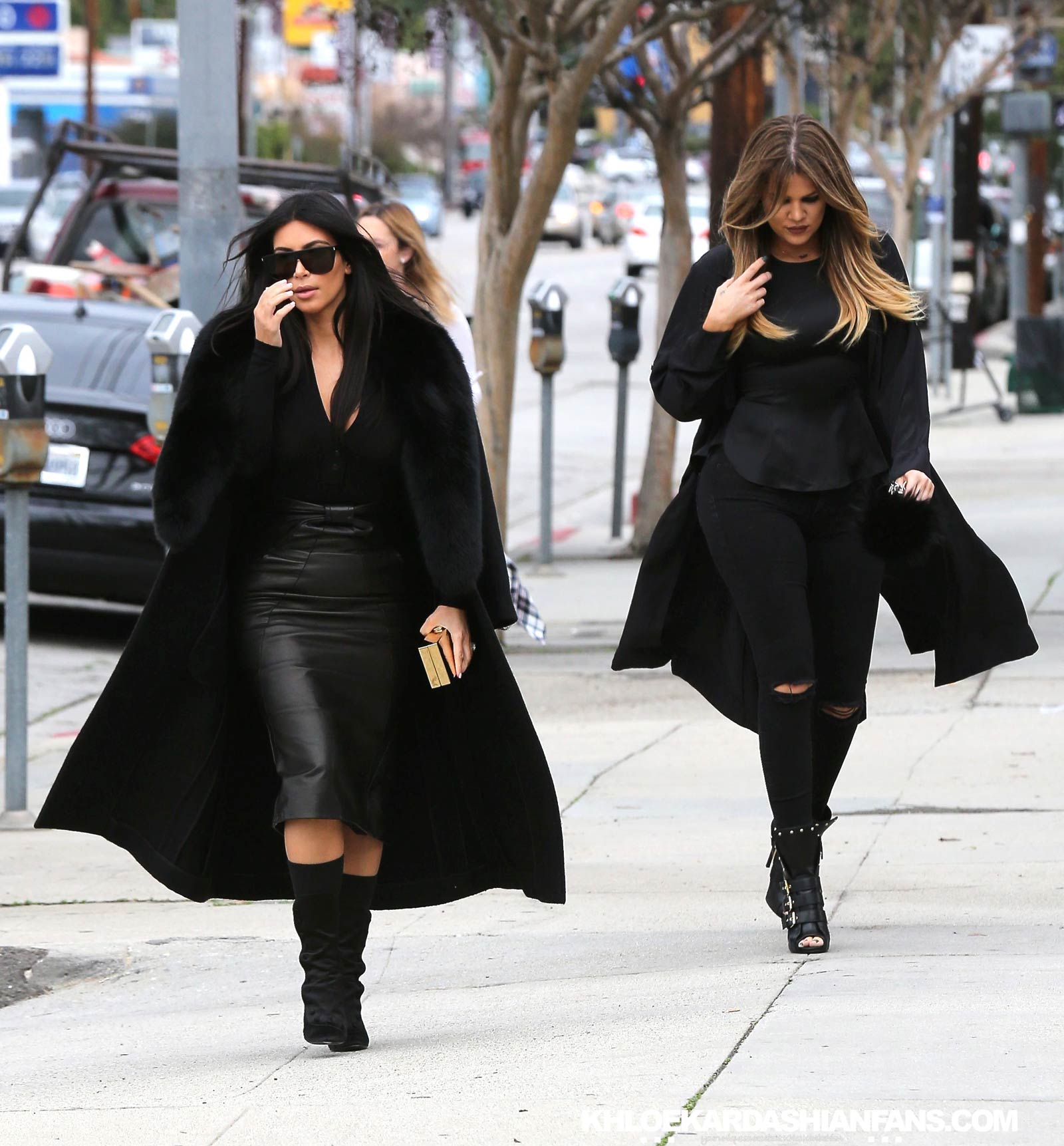 Kim & Khloe Kardashian arriving at Jenner Communications