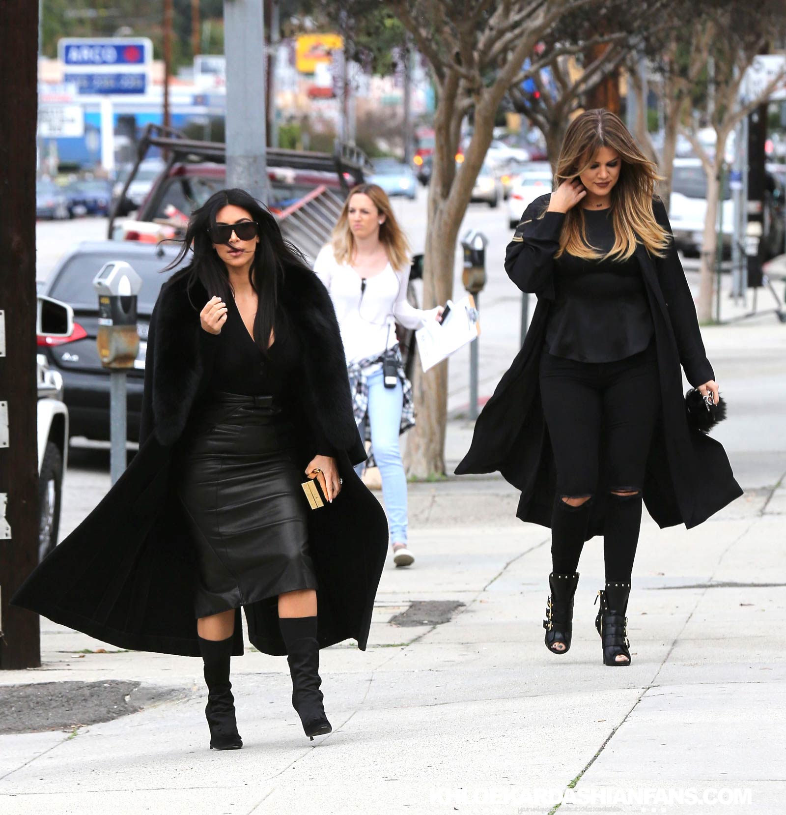 Kim & Khloe Kardashian arriving at Jenner Communications