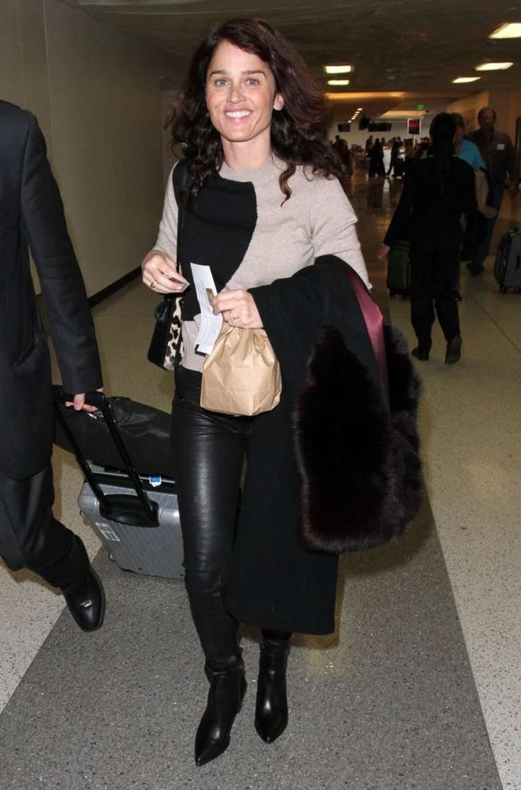 Robin Tunney departing on a flight at LAX airport