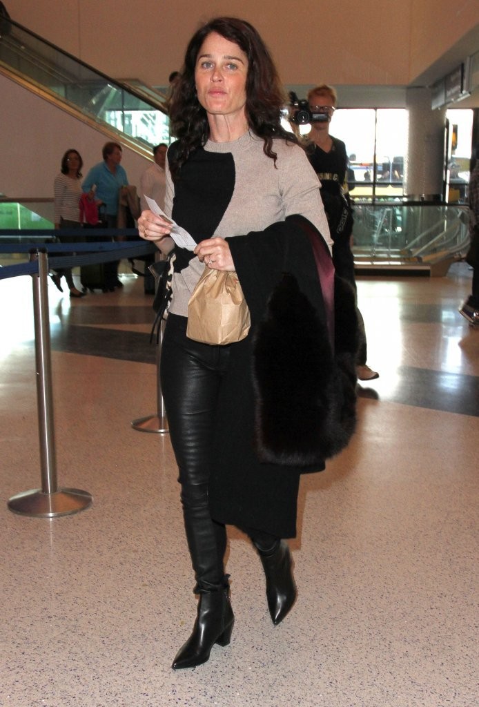 Robin Tunney departing on a flight at LAX airport