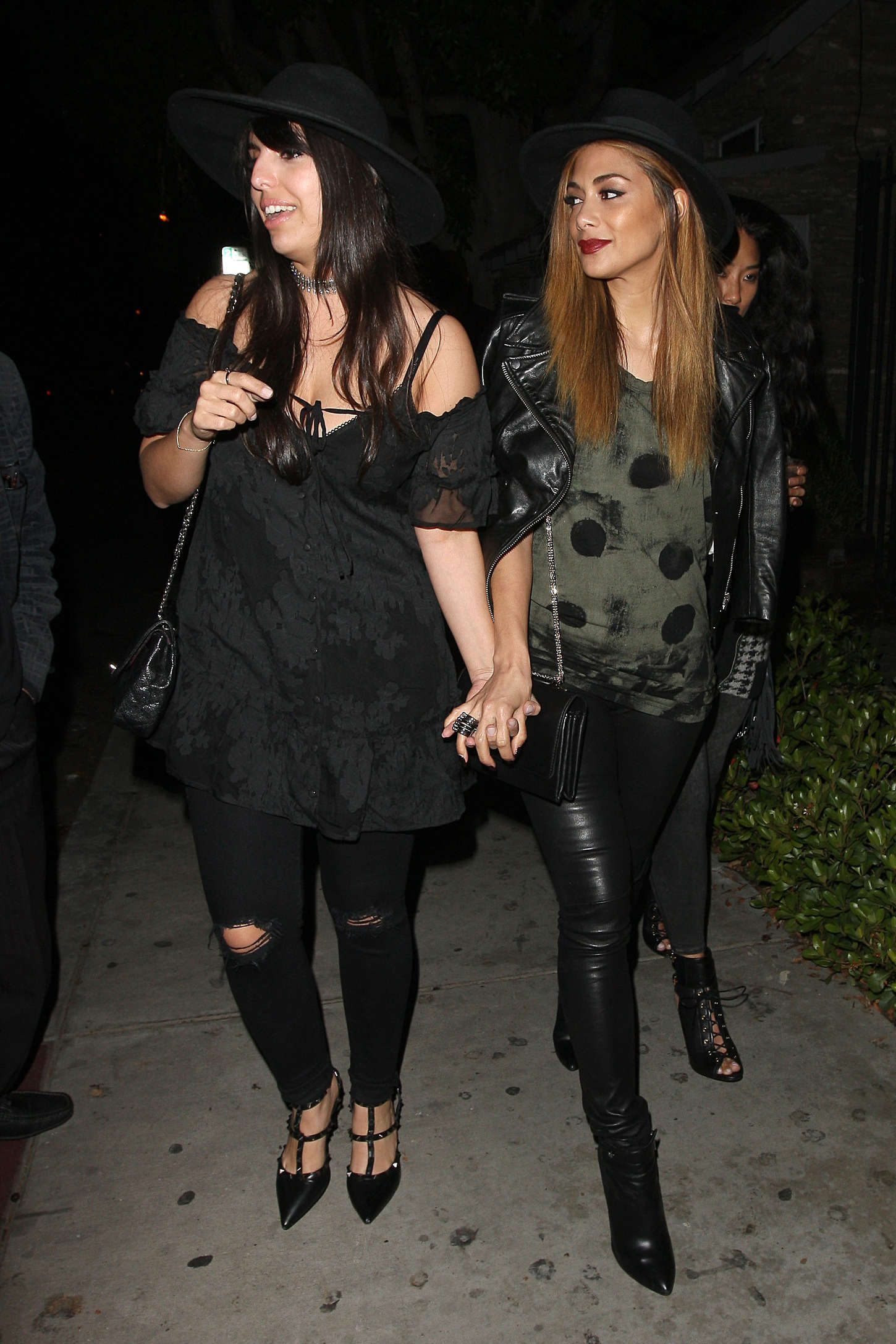 Nicole Scherzinger Leaves a Party with her friends