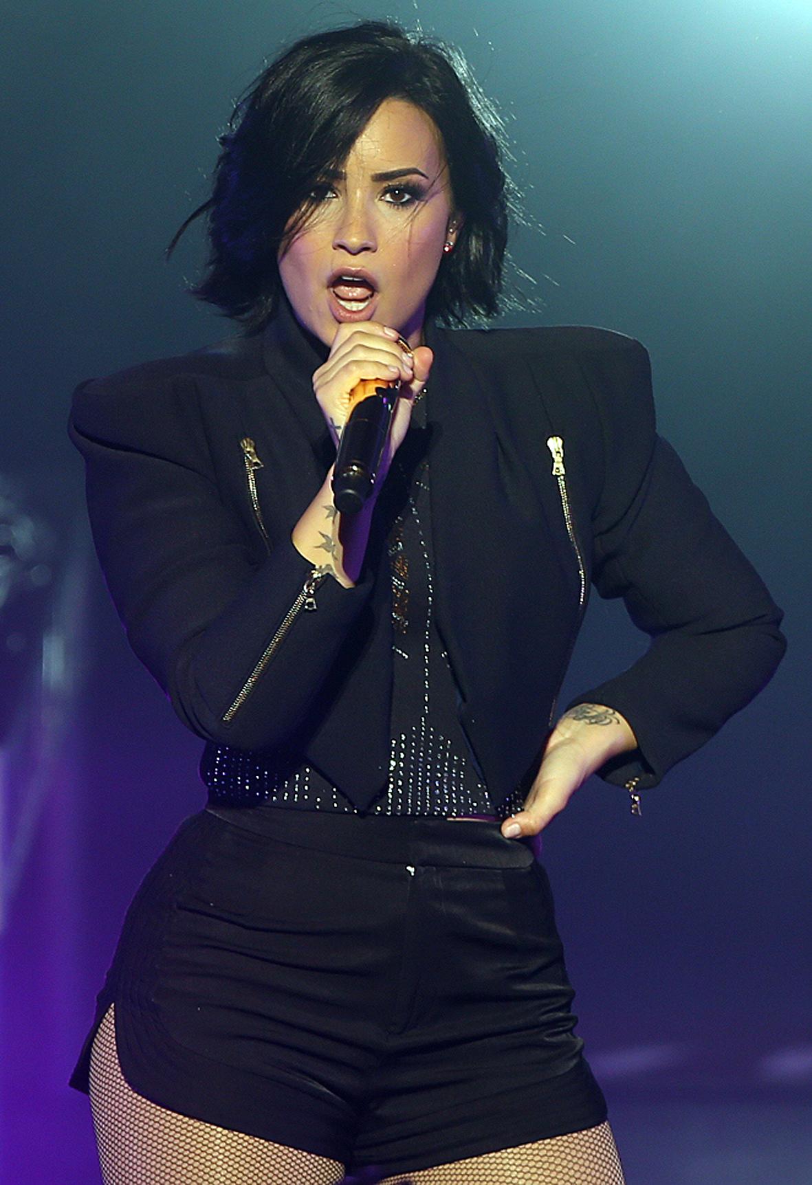 Demi Lovato performing at the Crowne Theatre