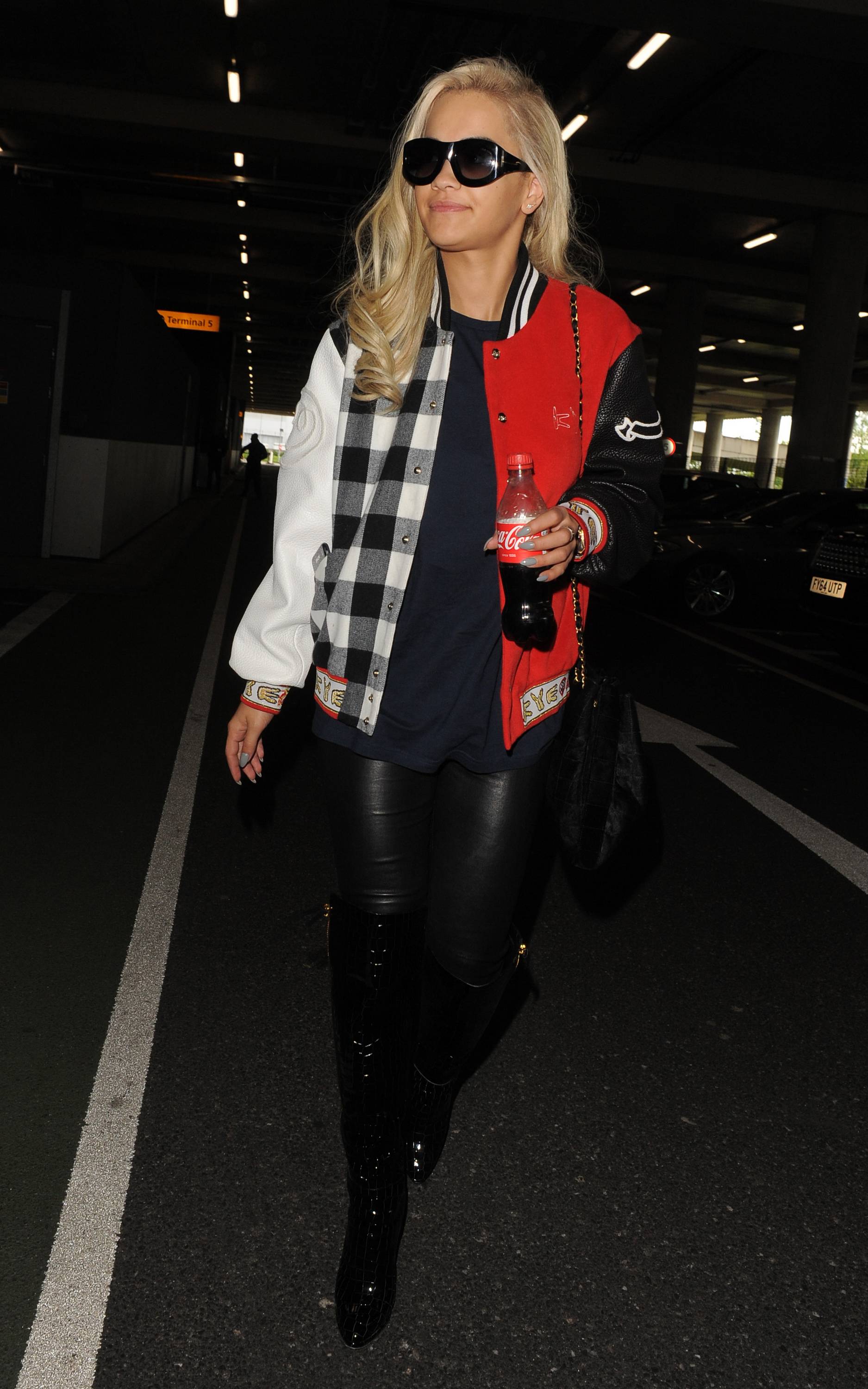 Rita Ora arrives at Heathrow Airport