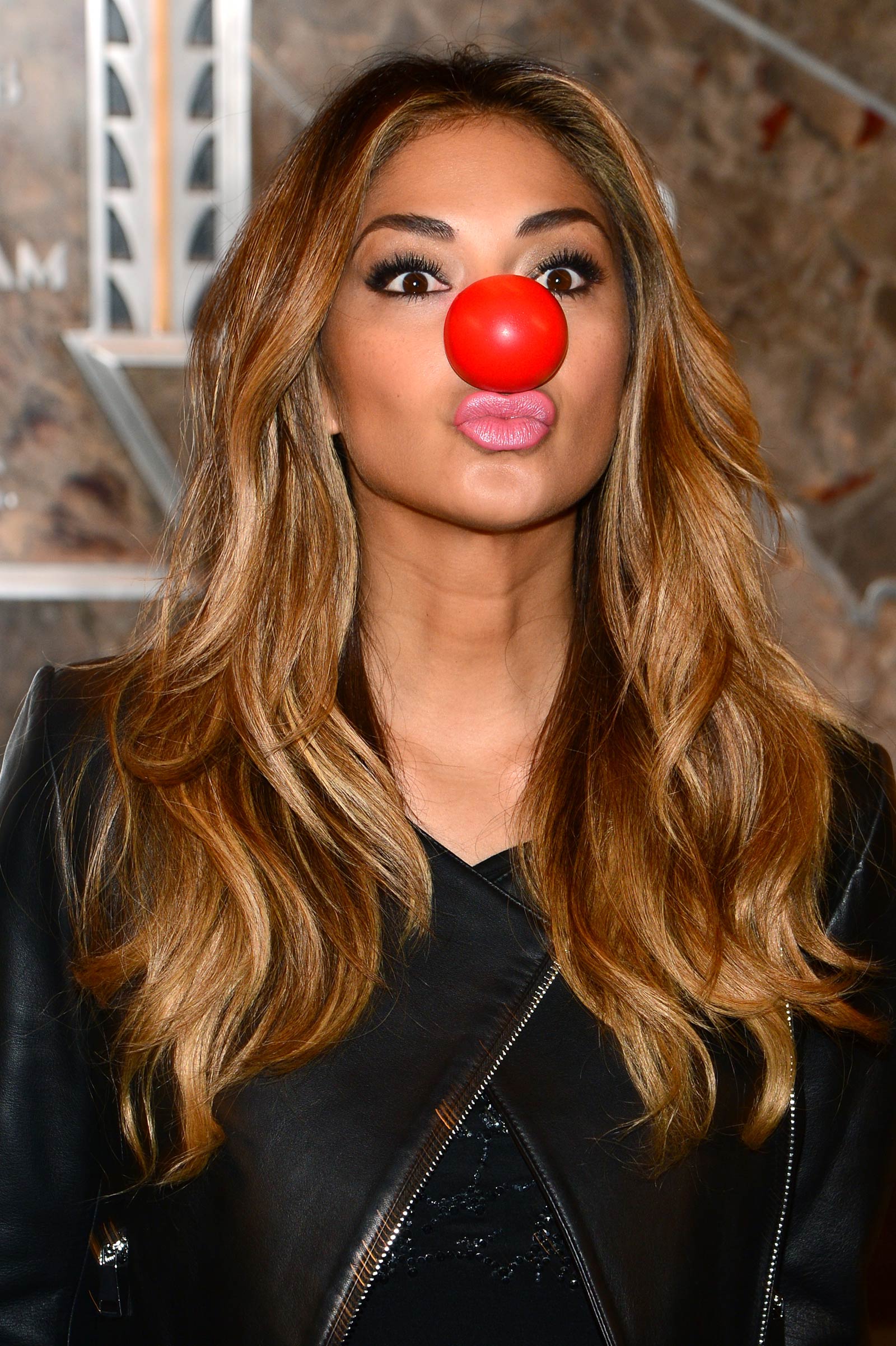 Nicole Scherzinger at Empire State Building celebrating Red Nose Day