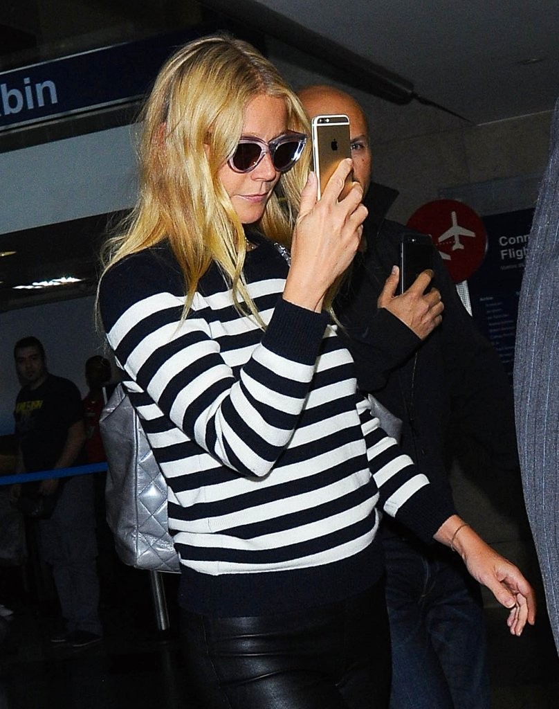 Gwyneth Paltrow arriving on a flight at LAX Airport