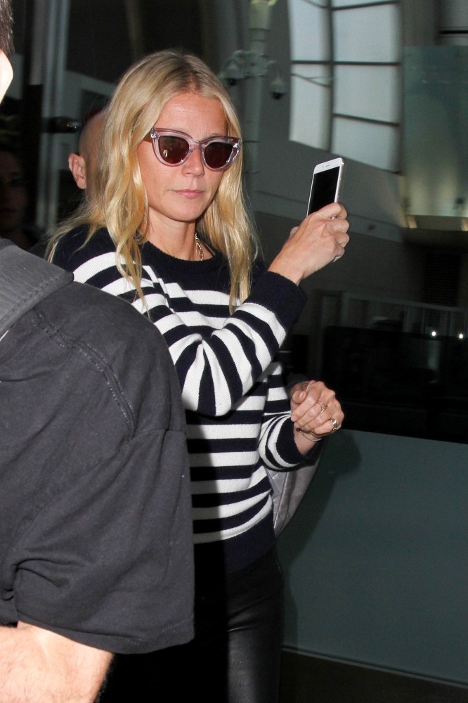 Gwyneth Paltrow arriving on a flight at LAX Airport