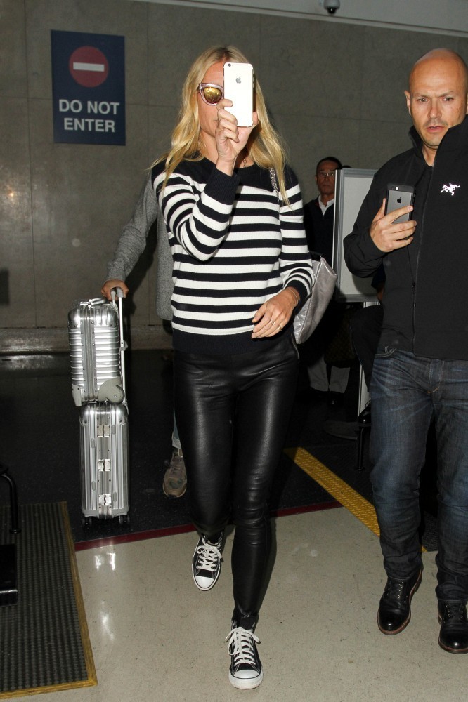 Gwyneth Paltrow arriving on a flight at LAX Airport