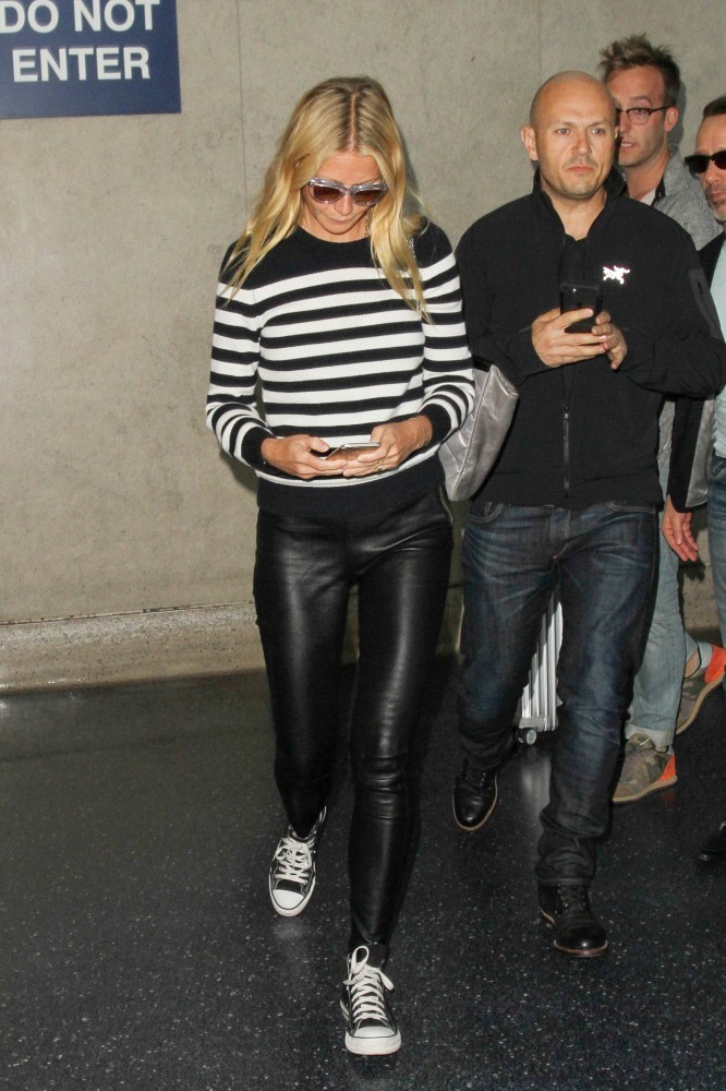 Gwyneth Paltrow arriving on a flight at LAX Airport