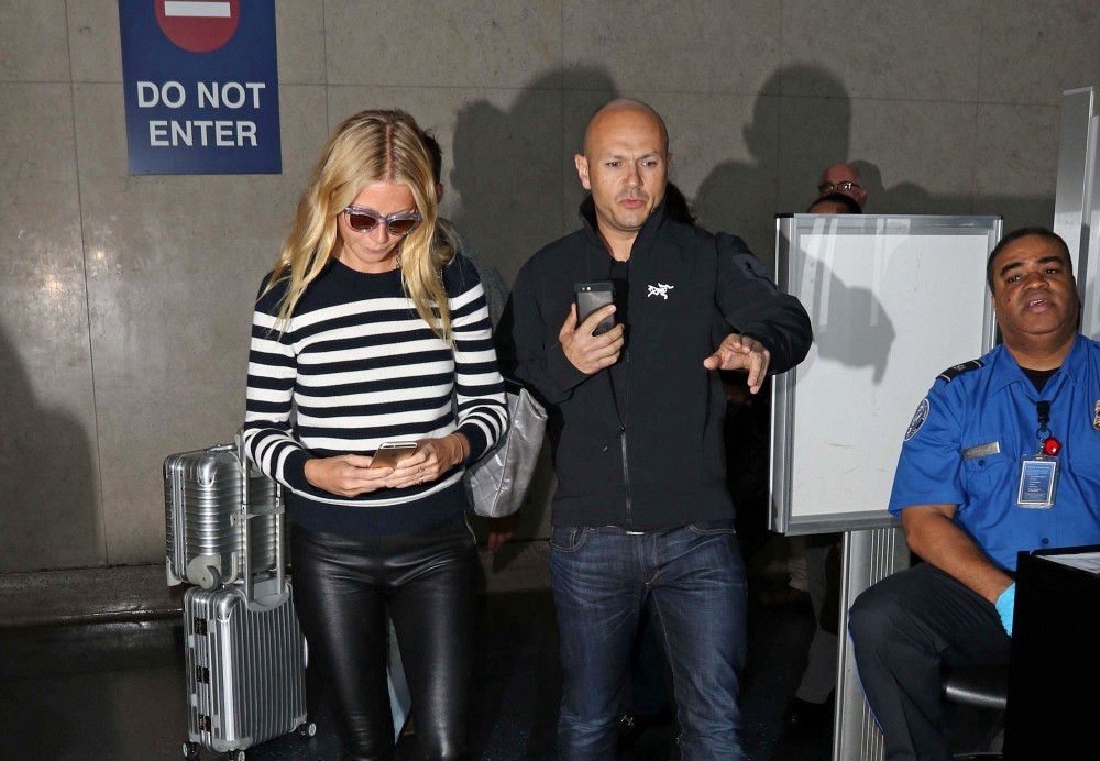 Gwyneth Paltrow arriving on a flight at LAX Airport