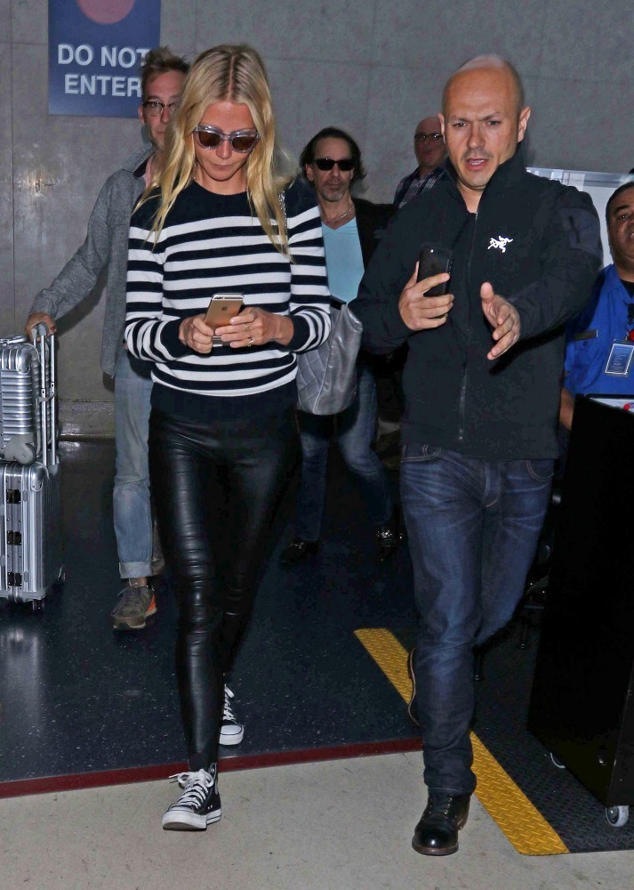 Gwyneth Paltrow arriving on a flight at LAX Airport