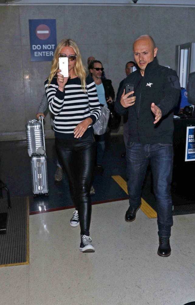 Gwyneth Paltrow arriving on a flight at LAX Airport