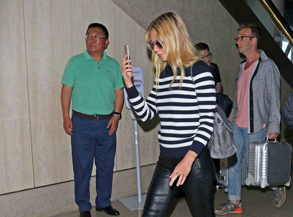 Gwyneth Paltrow arriving on a flight at LAX Airport