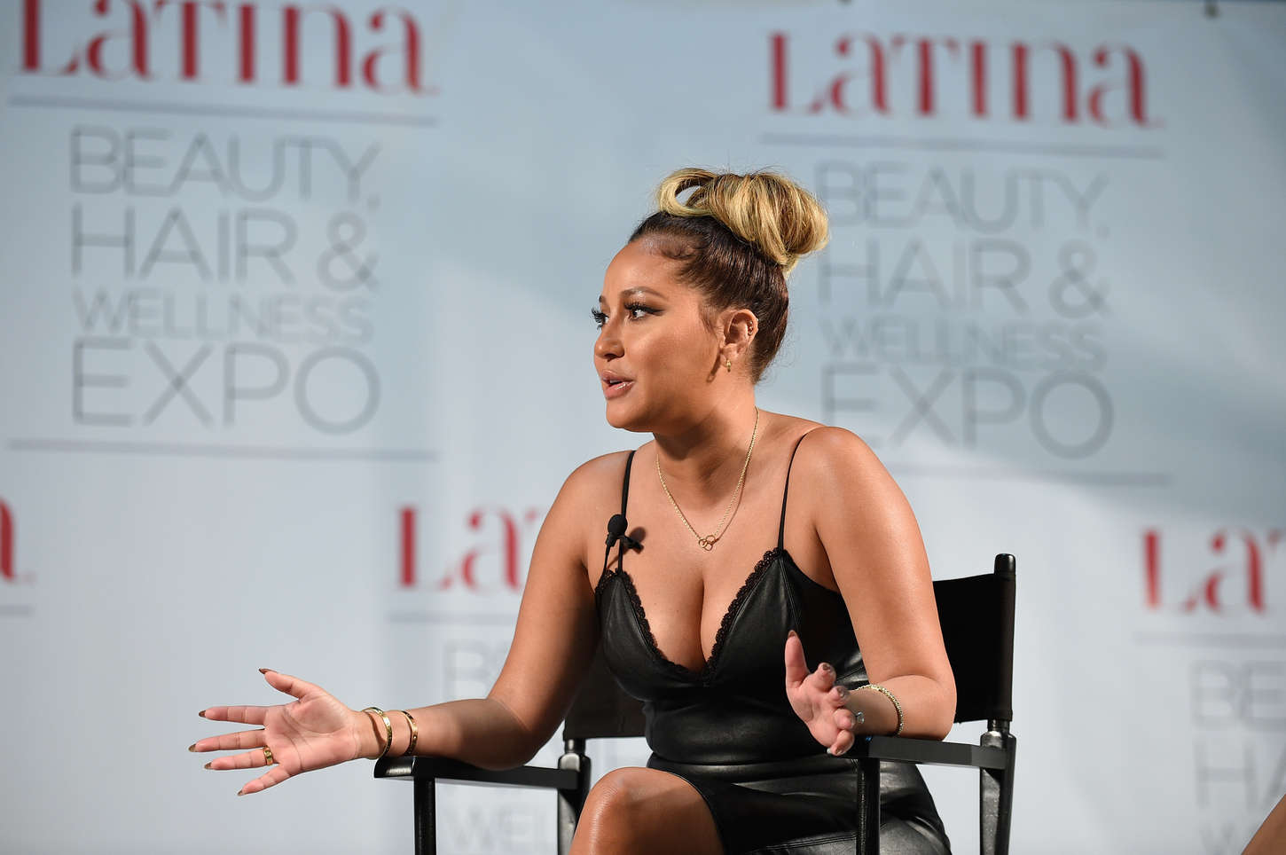 Adrienne Bailon attends the Latina Beauty, Hair & Wellness Expo