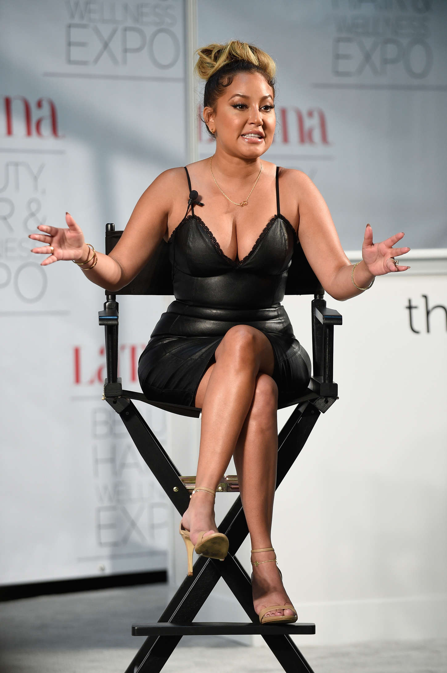 Adrienne Bailon attends the Latina Beauty, Hair & Wellness Expo