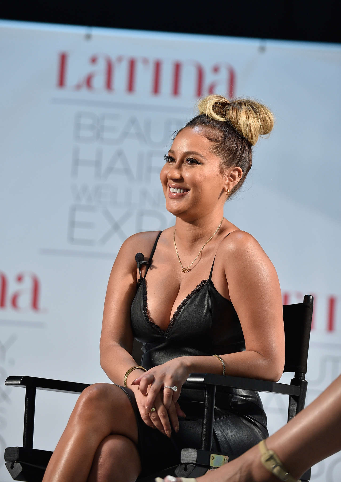 Adrienne Bailon attends the Latina Beauty, Hair & Wellness Expo