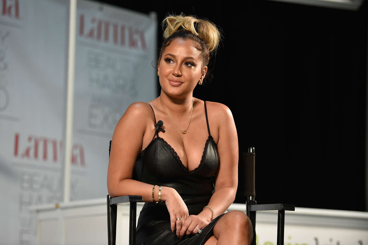 Adrienne Bailon attends the Latina Beauty, Hair & Wellness Expo