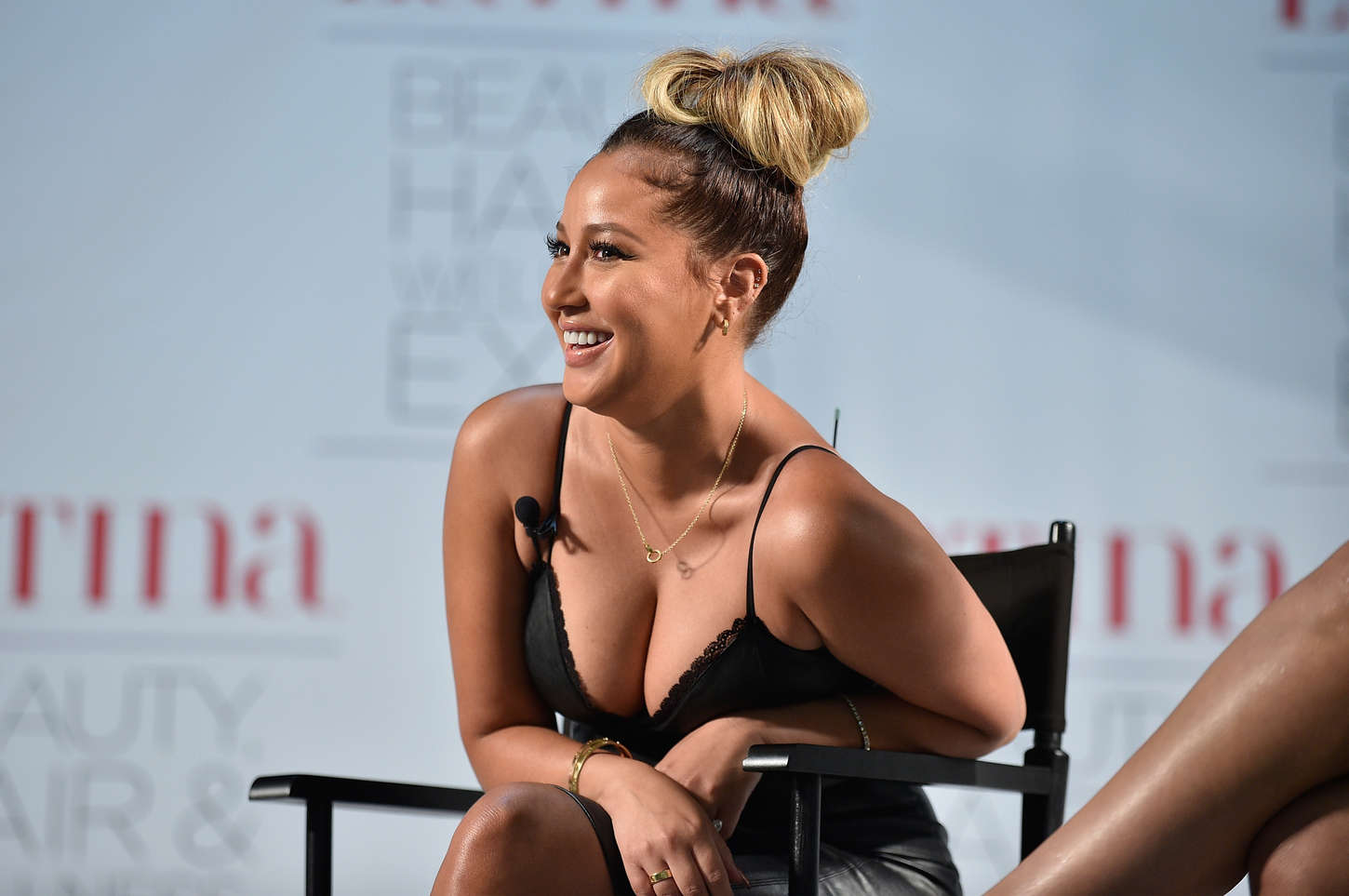 Adrienne Bailon attends the Latina Beauty, Hair & Wellness Expo