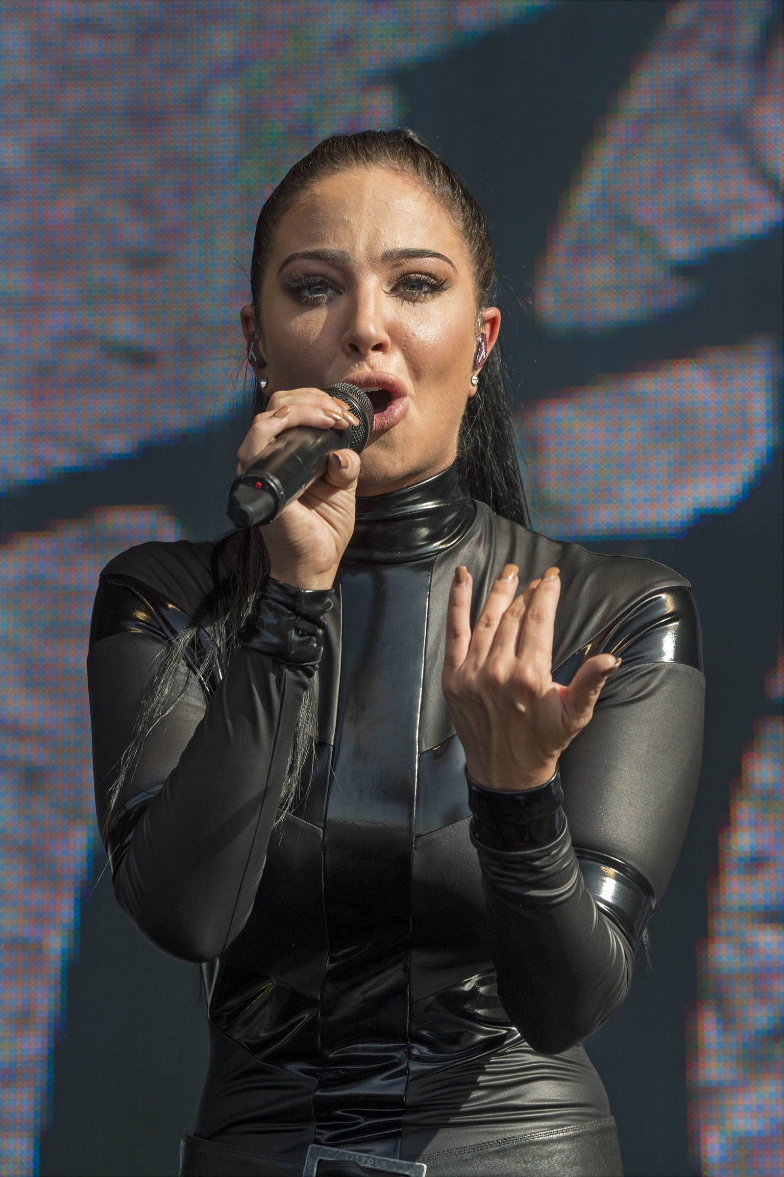 Tulisa Contostavlos performs on stage during Brighton Pride