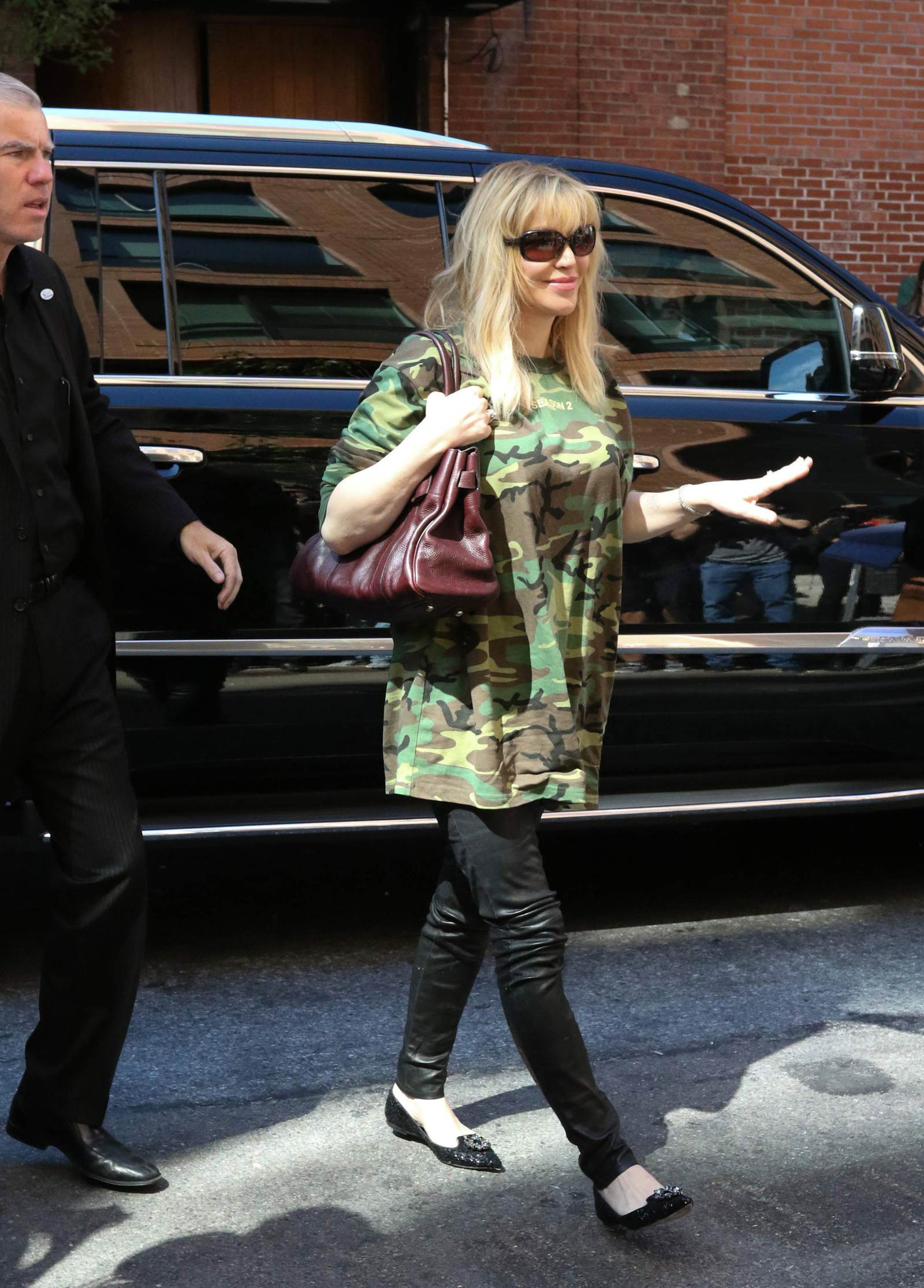 Courtney Love arrives at the Kanye West fashion show