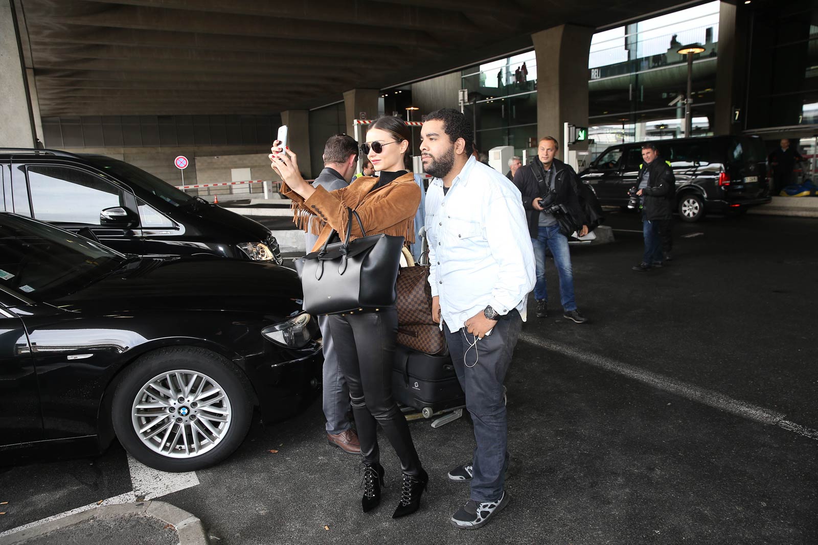 Miranda Kerr arrives at Charles De Gaulle Airport