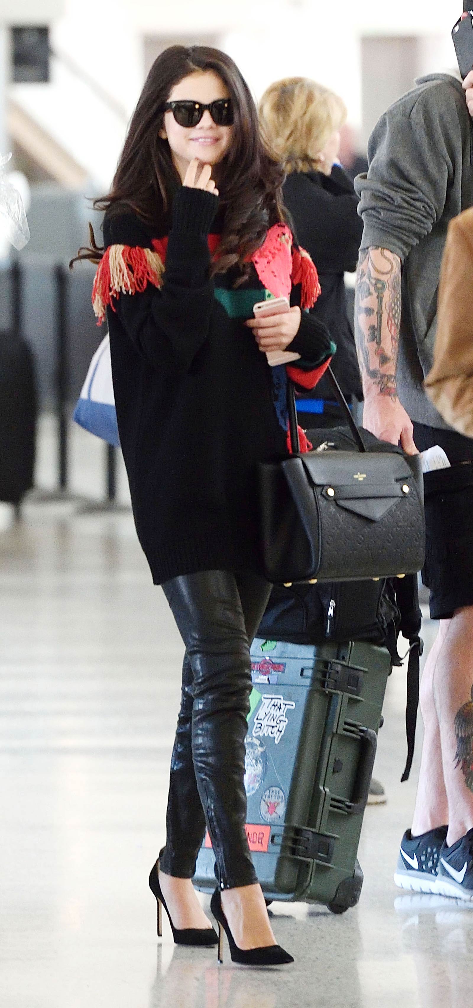 Selena Gomez departing from JFK Airport