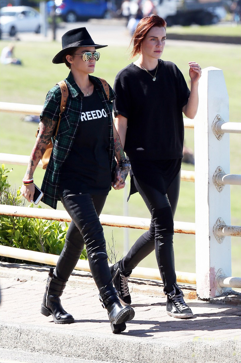 Ruby Rose and her fiancee Phoebe Dahl hold hands