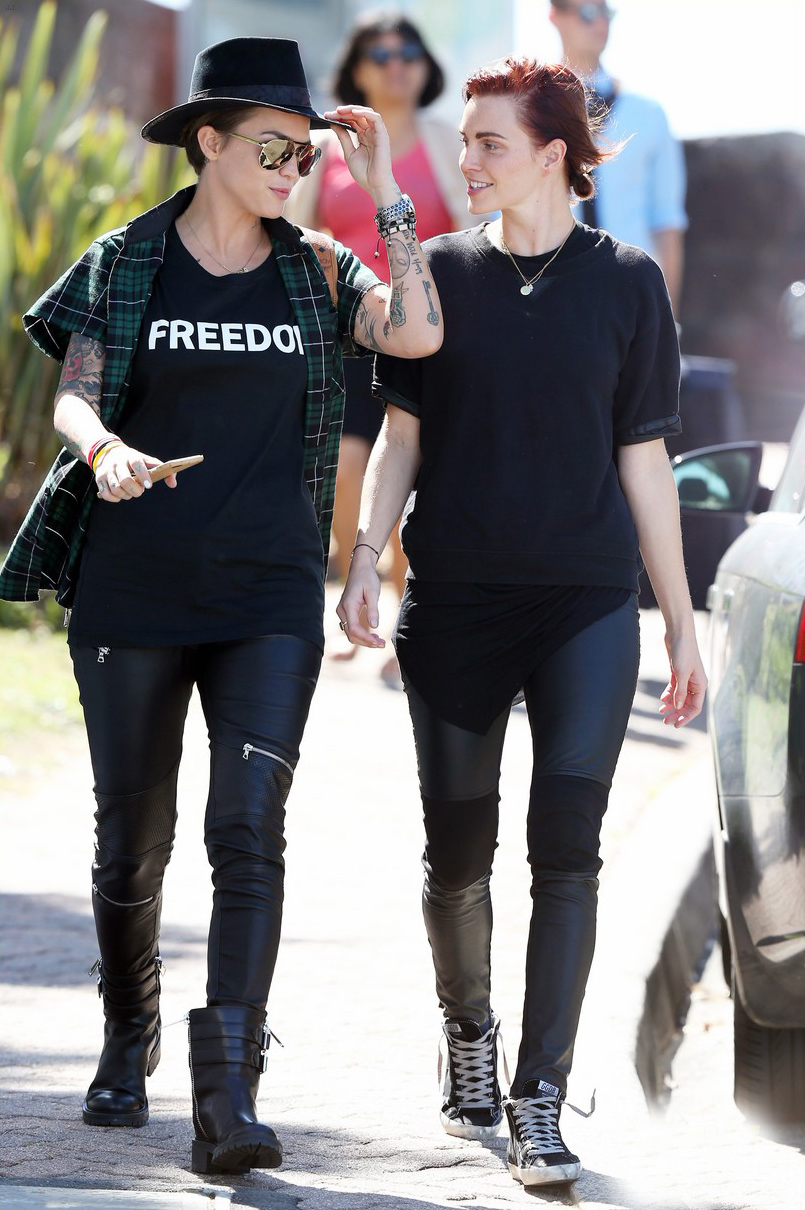 Ruby Rose and her fiancee Phoebe Dahl hold hands