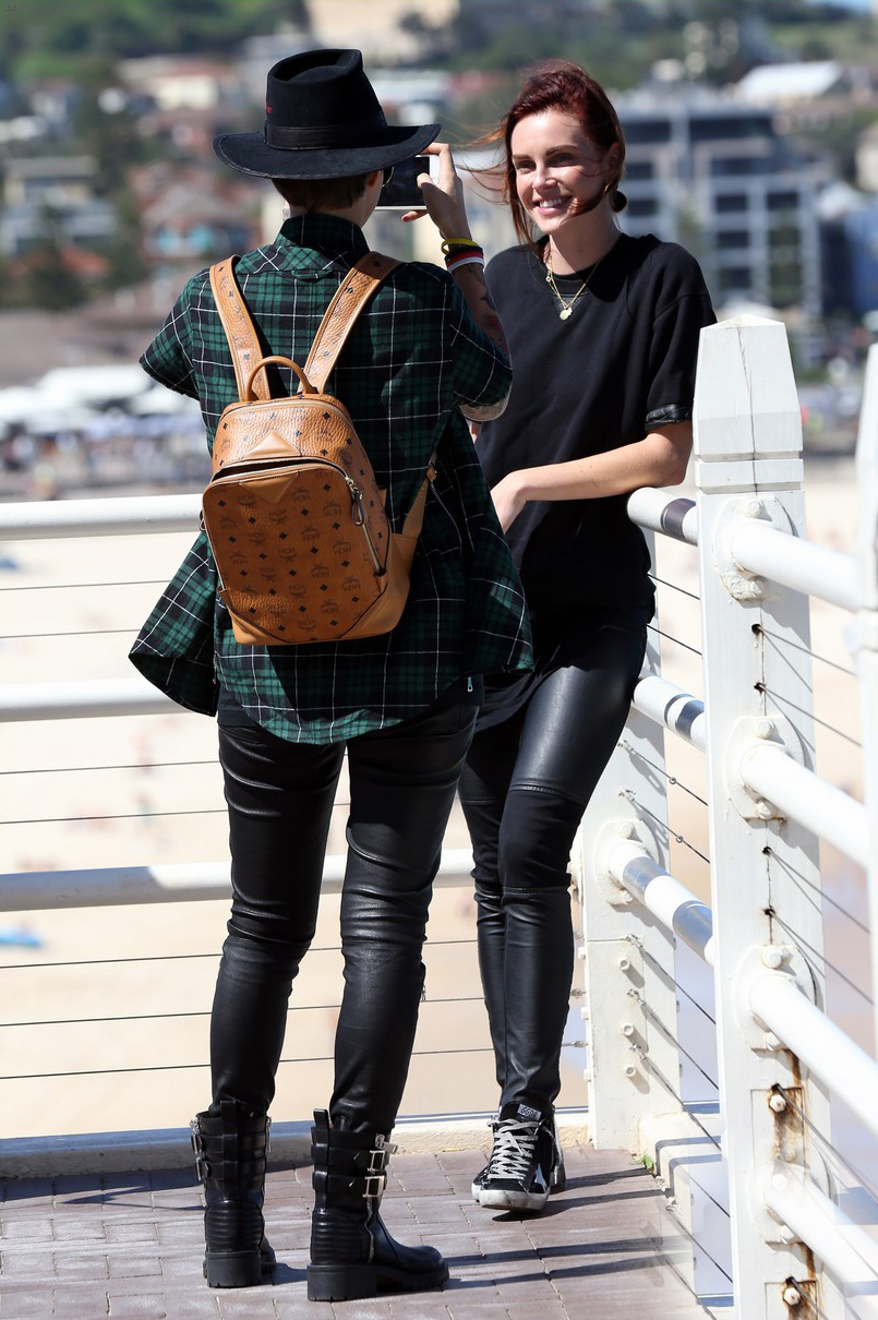 Ruby Rose and her fiancee Phoebe Dahl hold hands