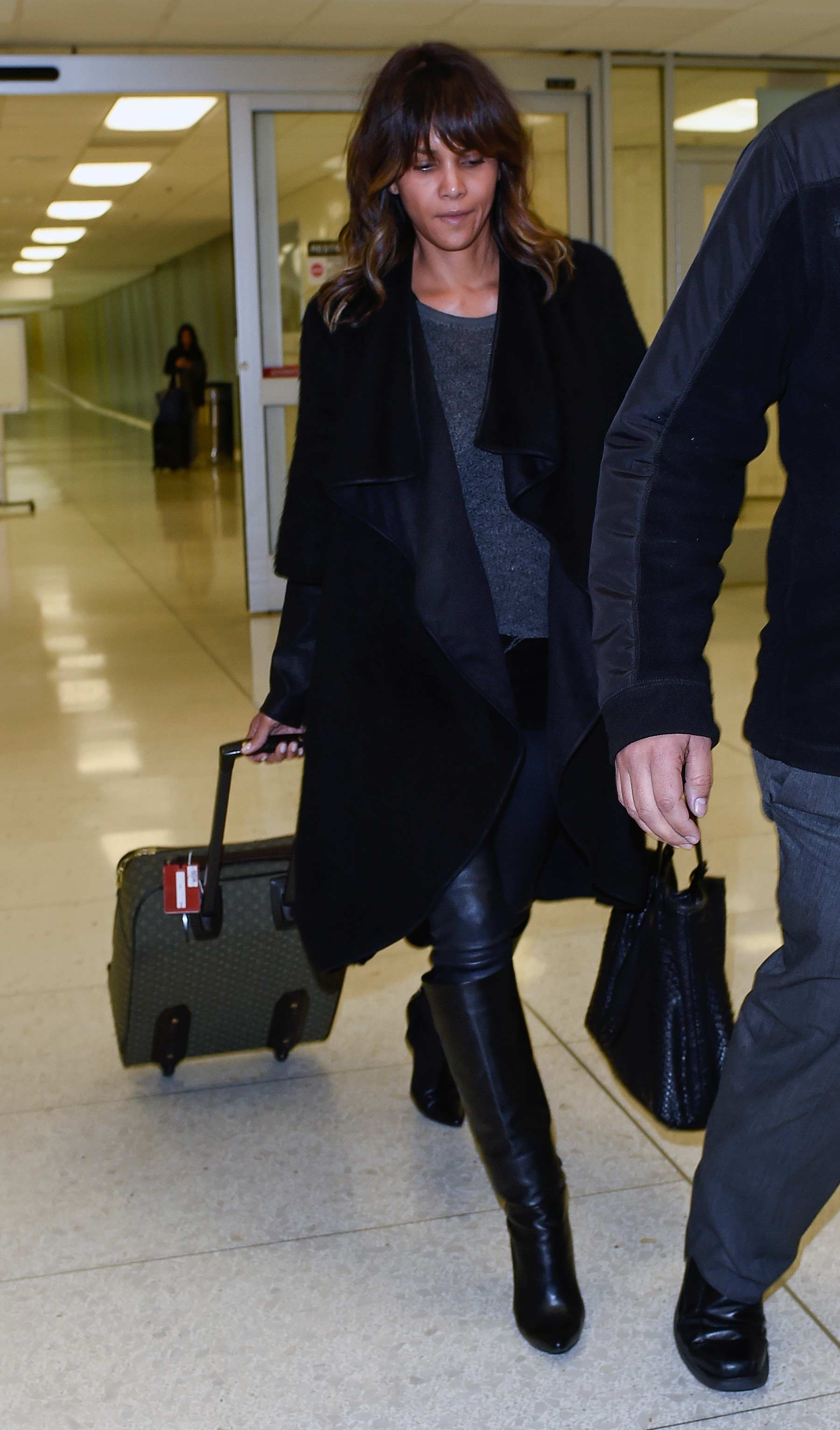 Halle Berry is seen arriving on a flight at LAX airport