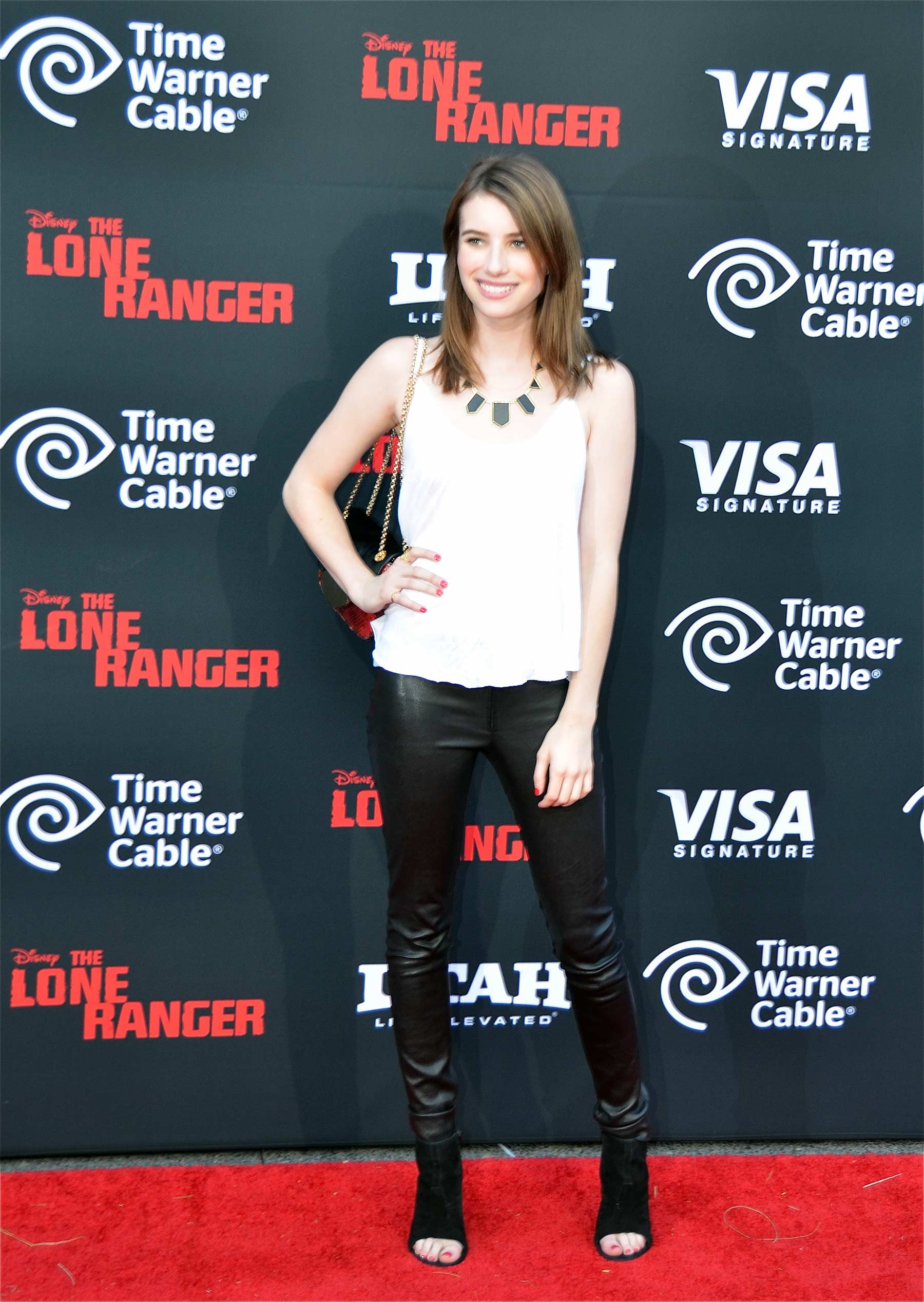 Emma Roberts attends The World Premiere of The Lone Ranger