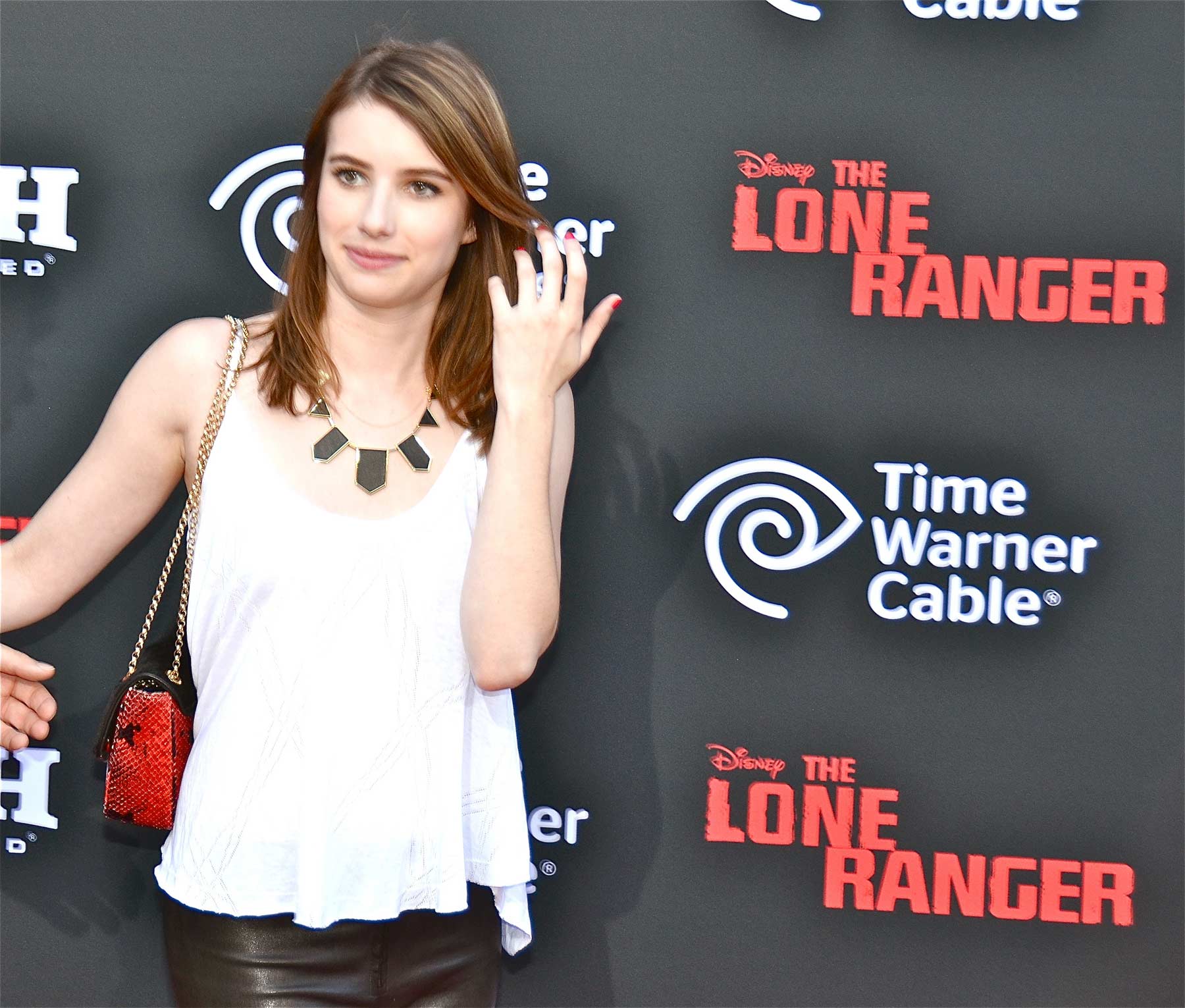 Emma Roberts attends The World Premiere of The Lone Ranger