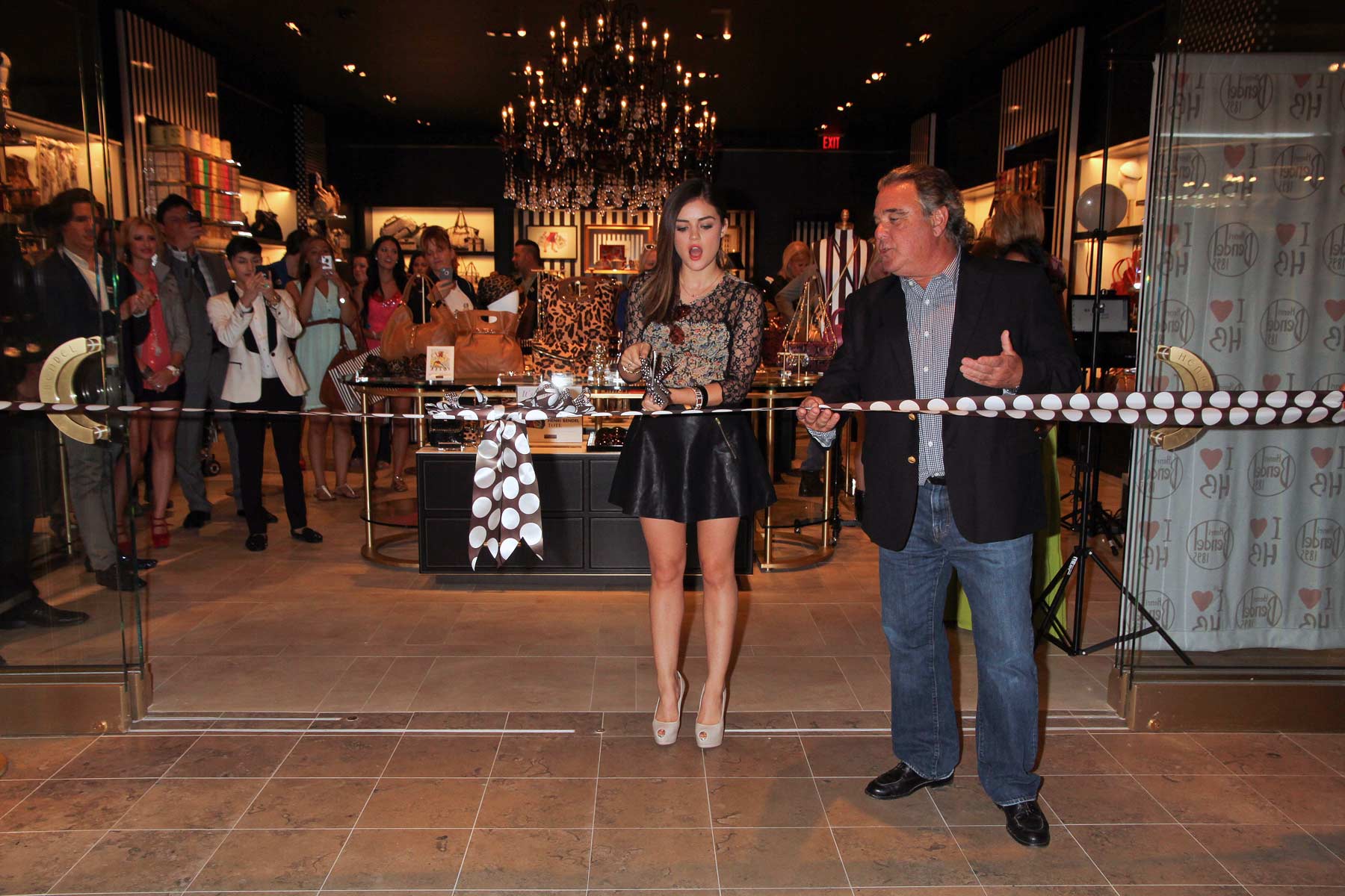 Lucy Hale attends the Fashion Show Mall