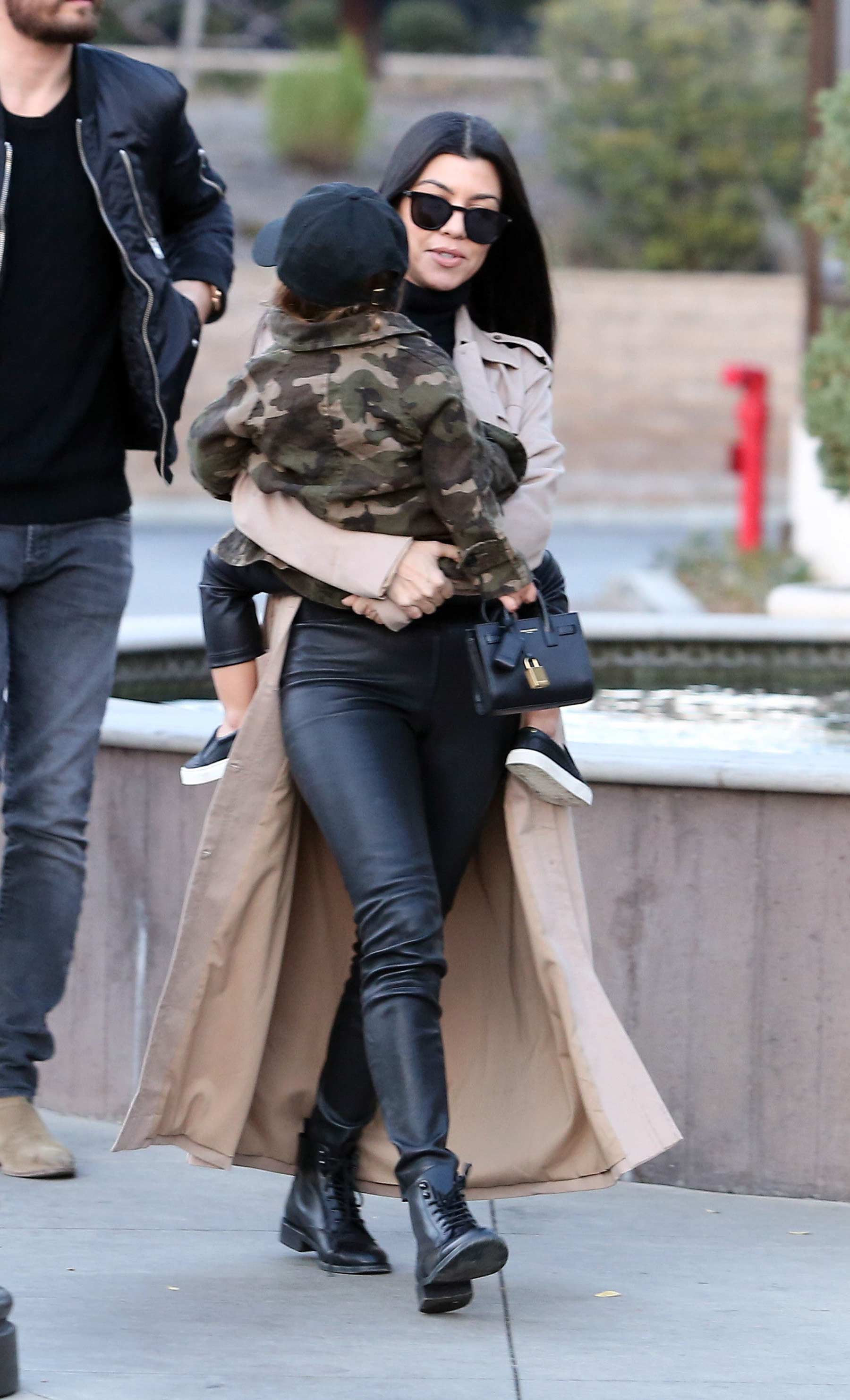 Kourtney Kardashian at a movie theater with her family