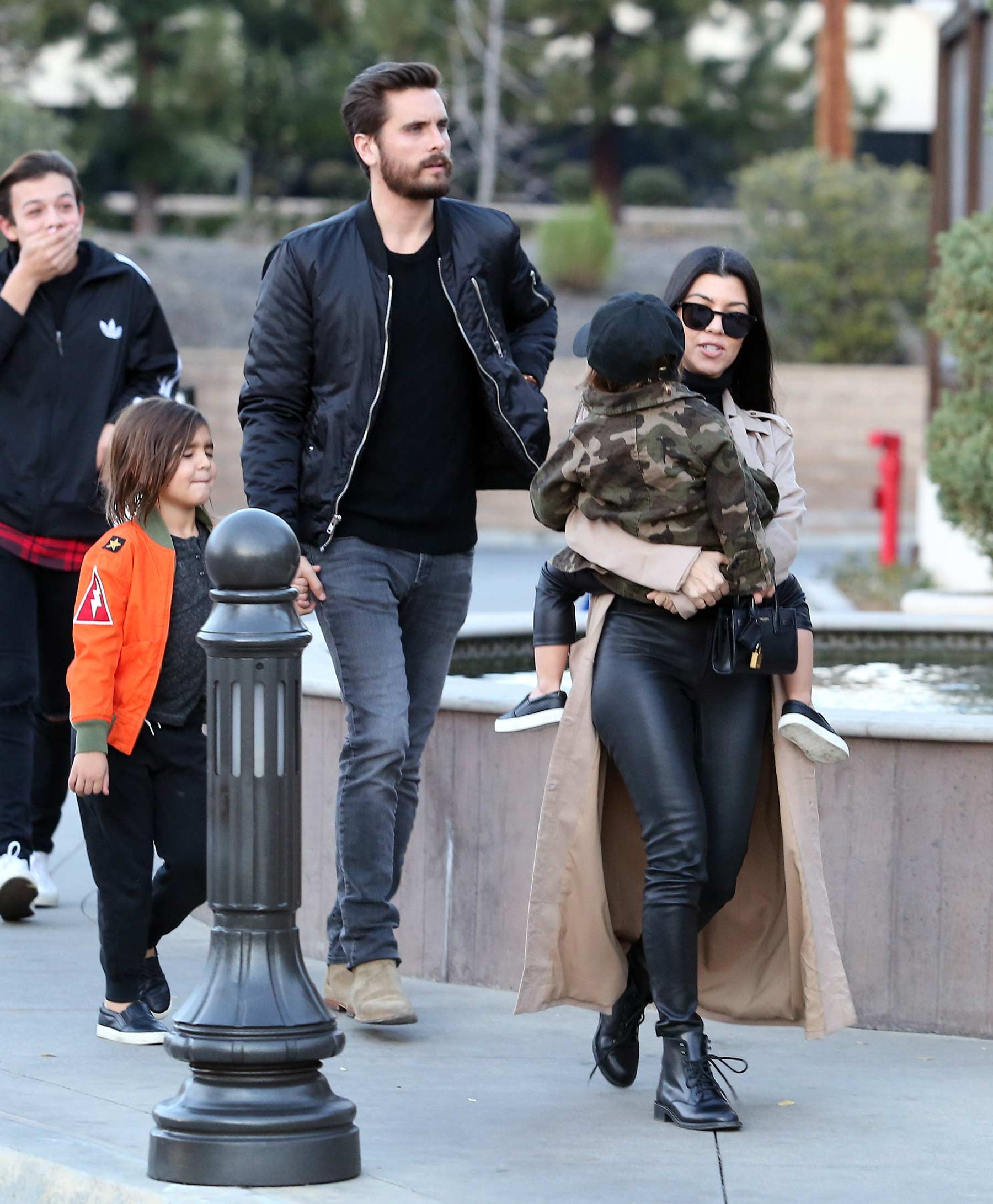 Kourtney Kardashian at a movie theater with her family