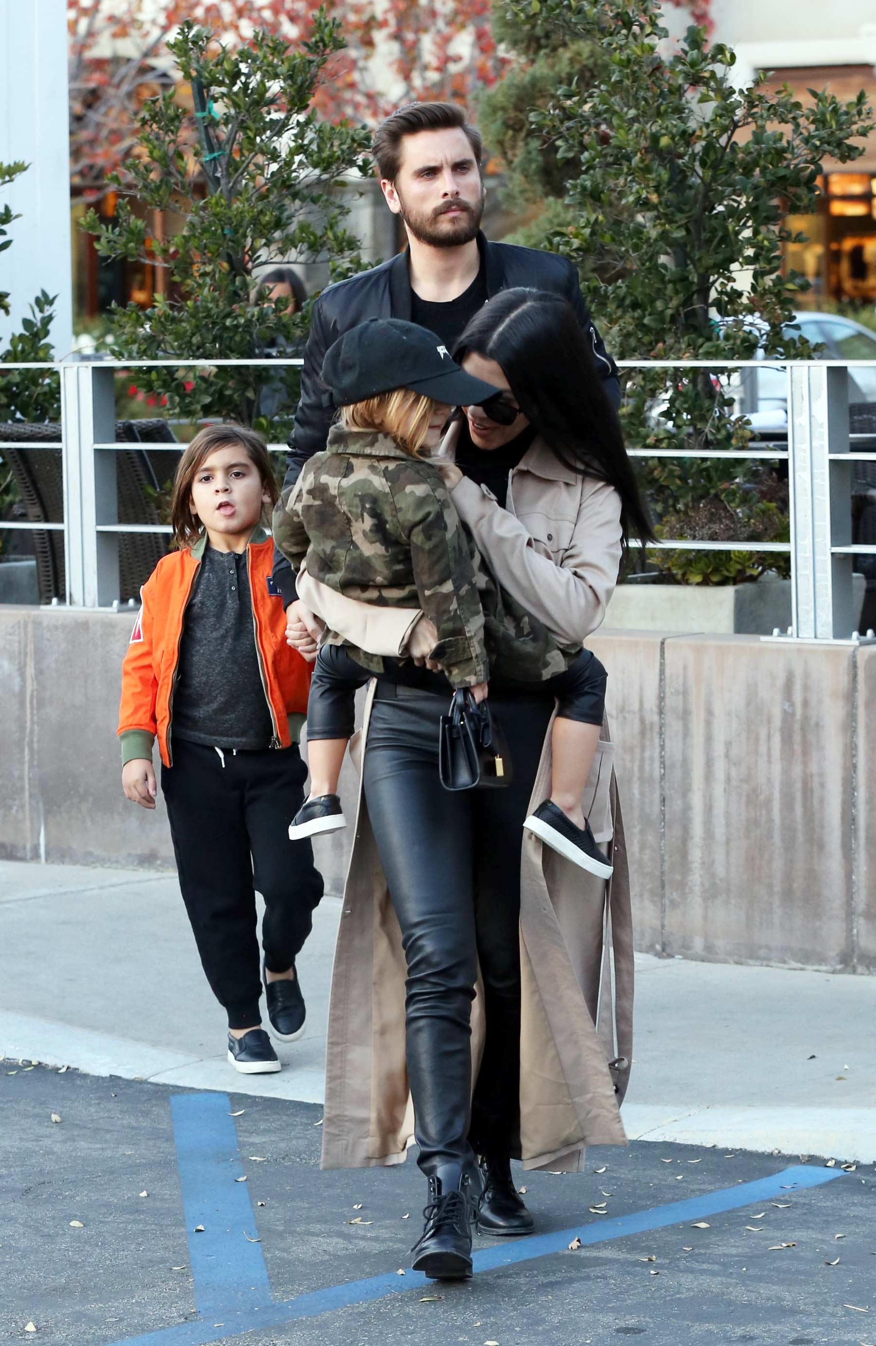 Kourtney Kardashian at a movie theater with her family