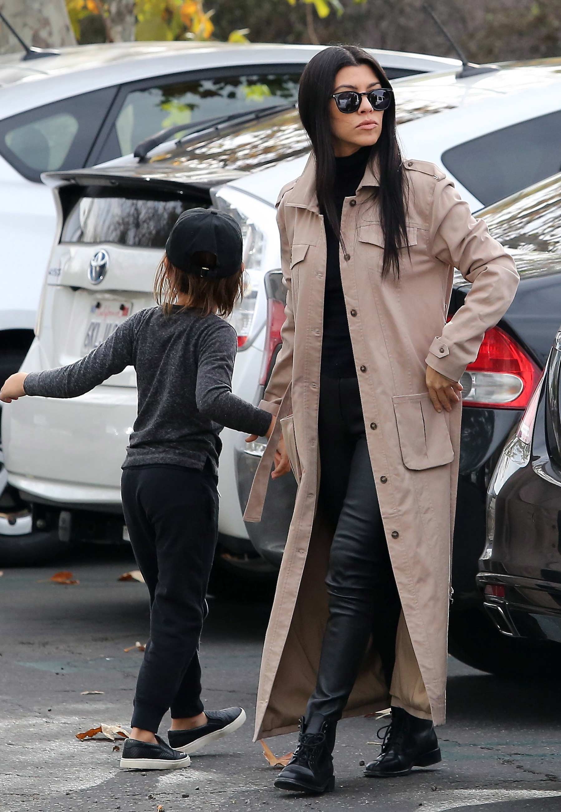 Kourtney Kardashian at a movie theater with her family