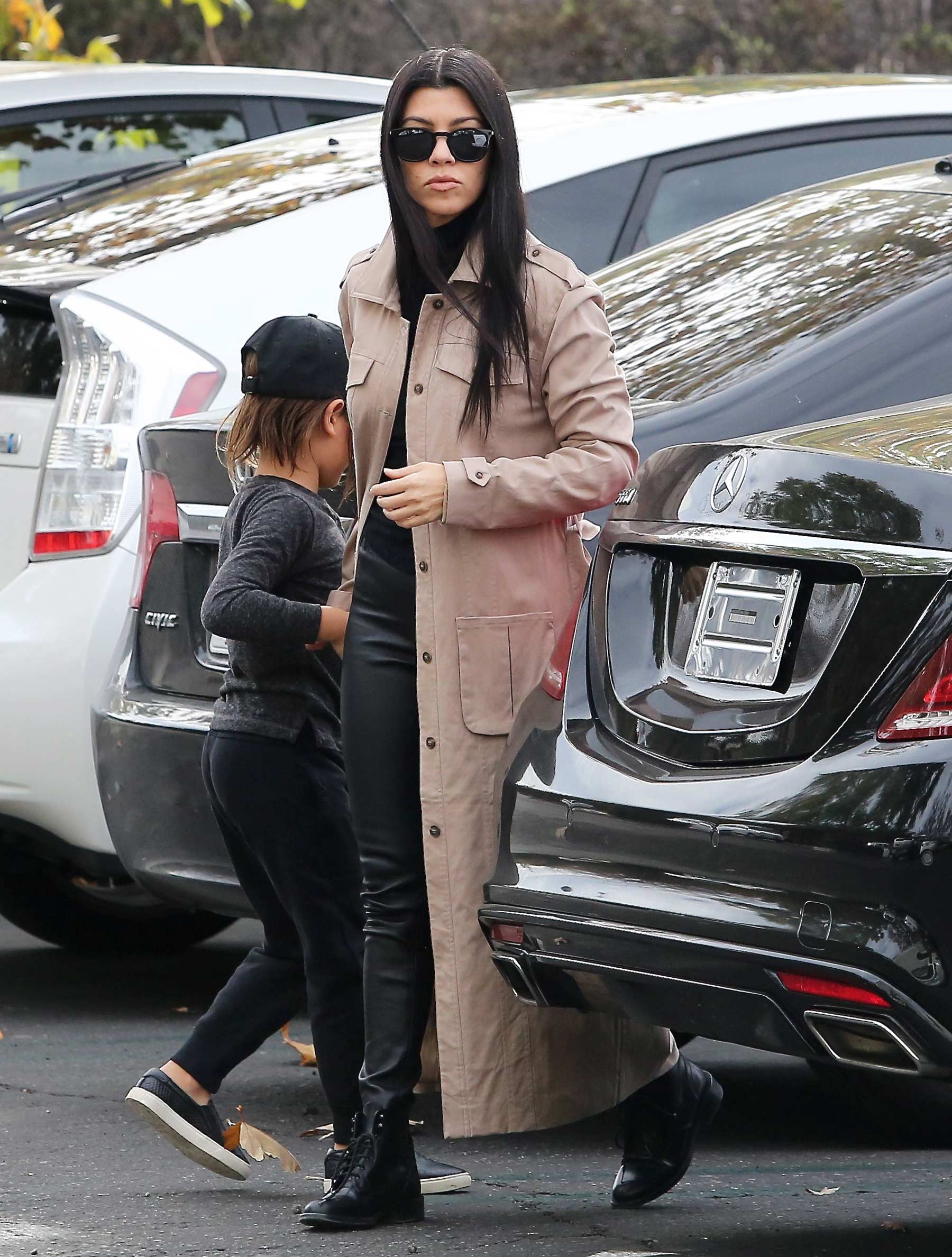 Kourtney Kardashian at a movie theater with her family