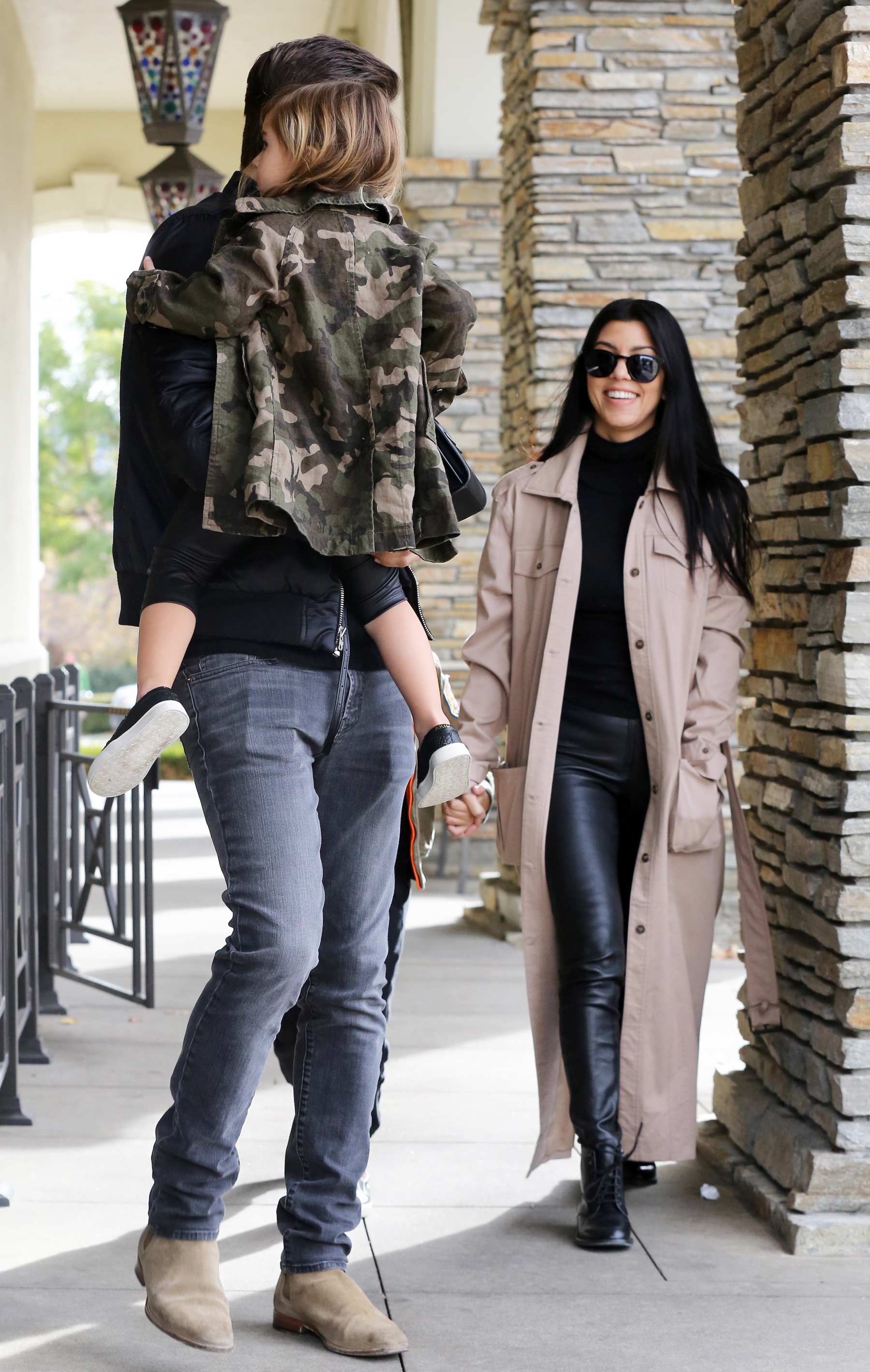 Kourtney Kardashian at a movie theater with her family