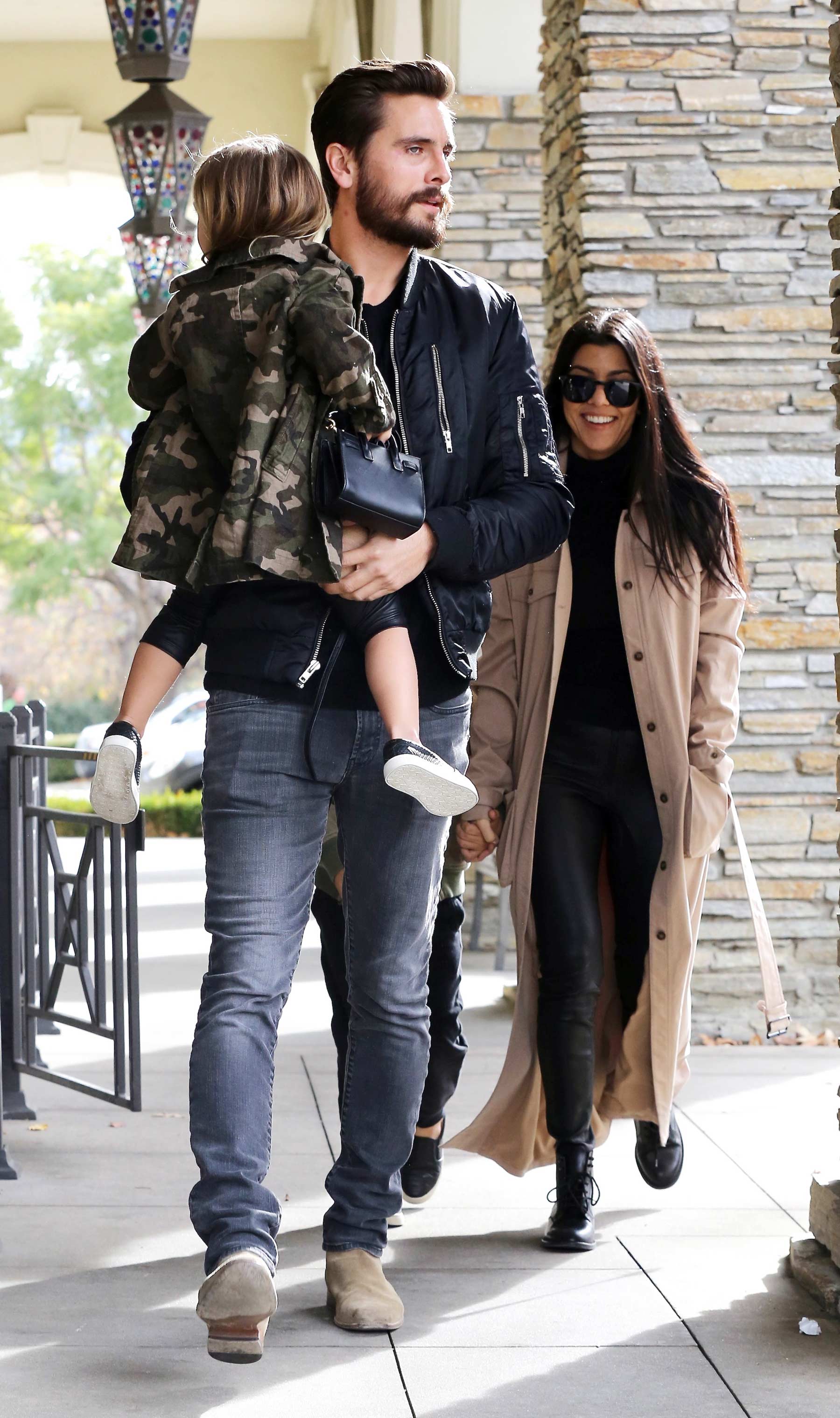 Kourtney Kardashian at a movie theater with her family