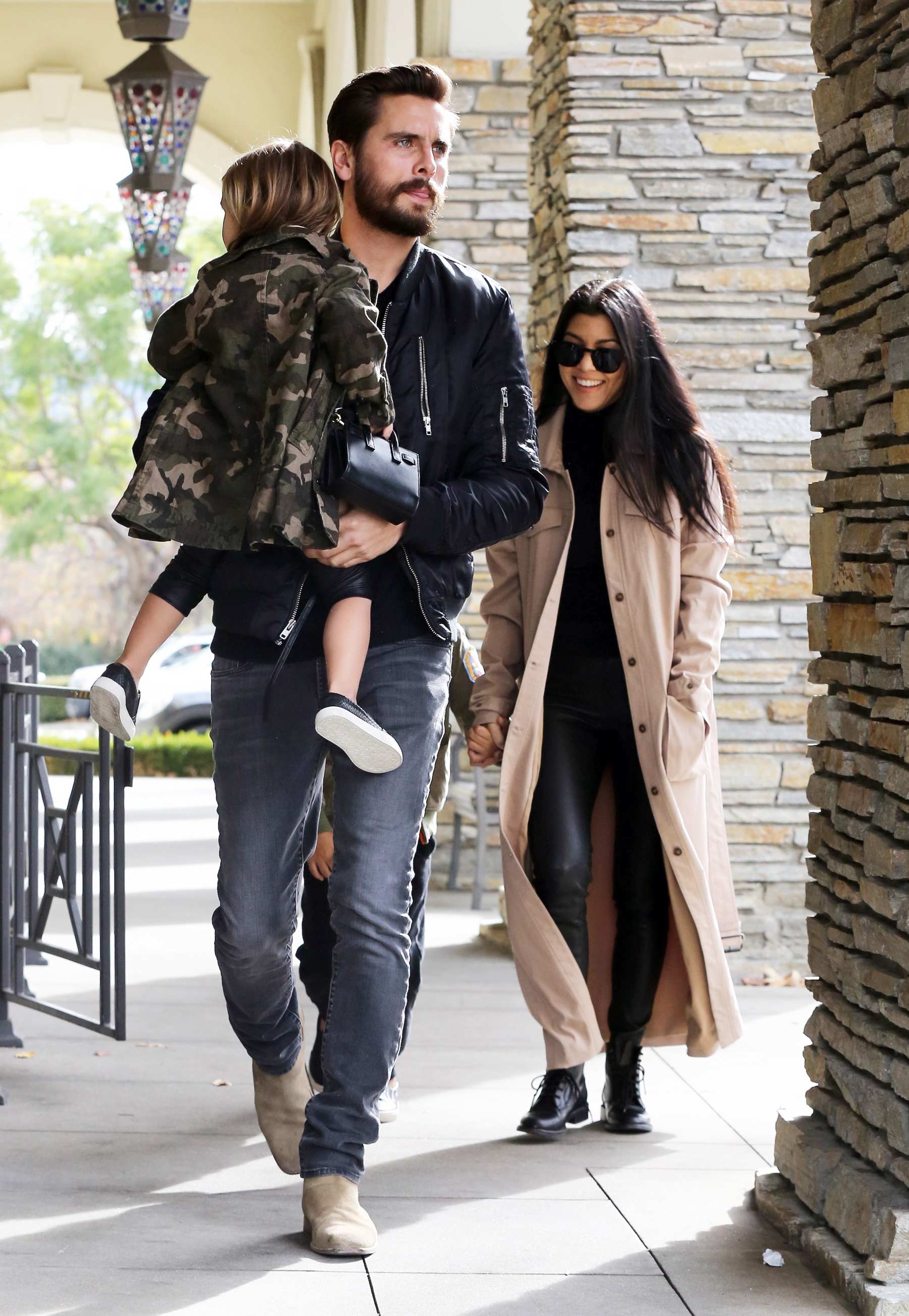 Kourtney Kardashian at a movie theater with her family