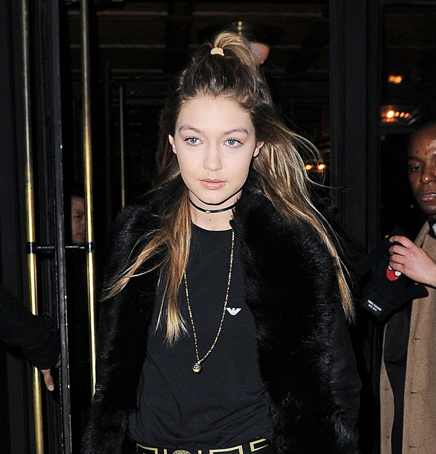 Gigi Hadid step out of an apartment building