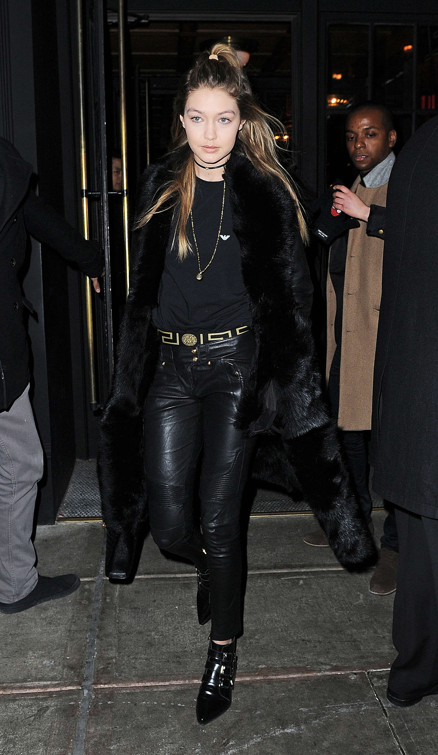 Gigi Hadid step out of an apartment building