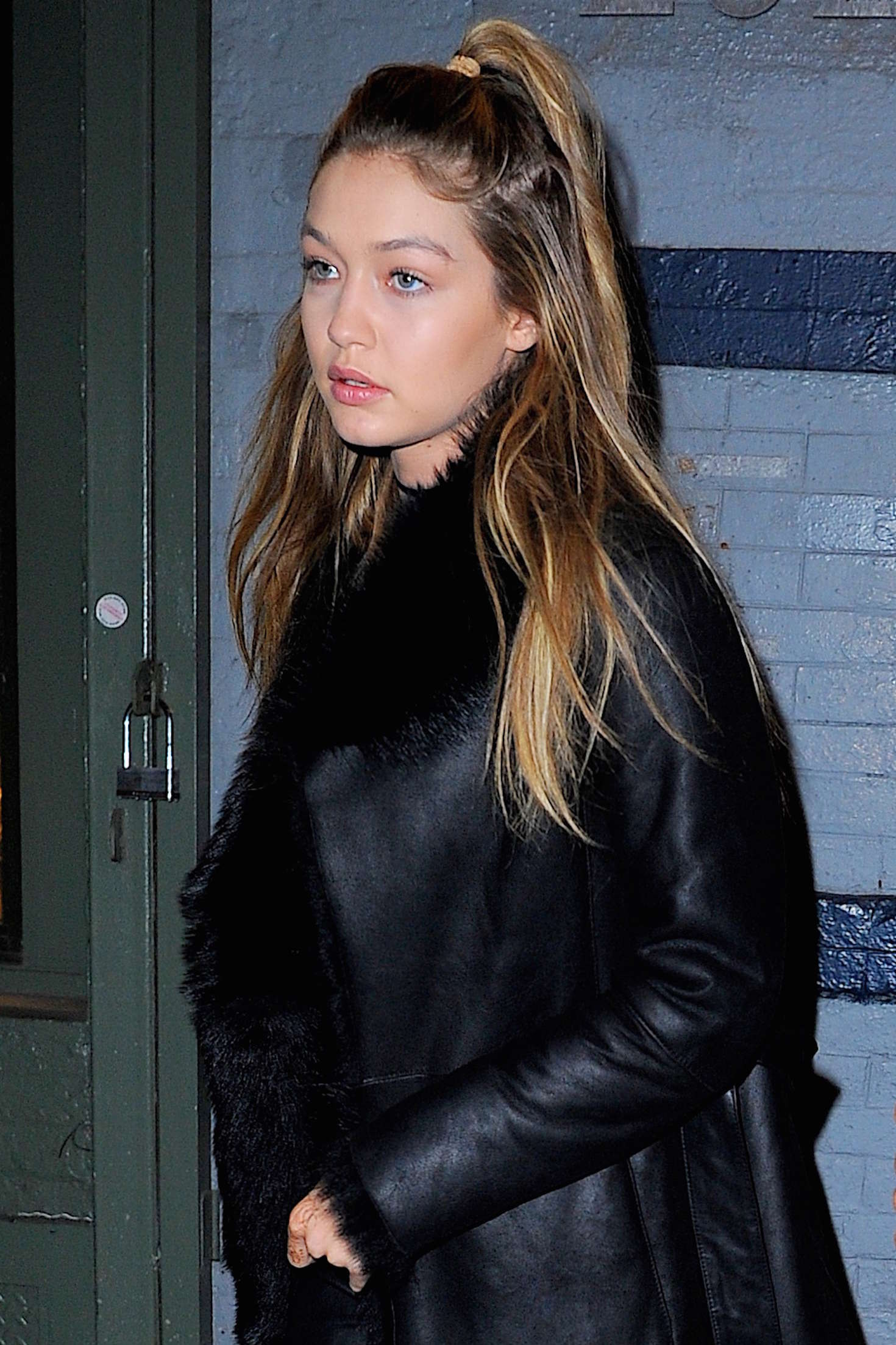 Gigi Hadid step out of an apartment building