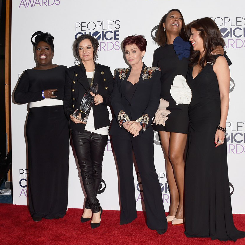 Sara Gilbert pose in the press room at the 2016 People’s Choice Awards