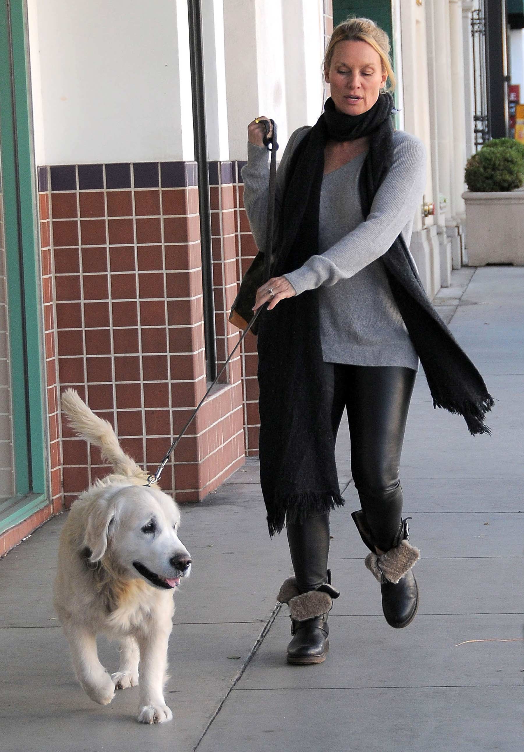 Nicollette Sheridan out with her dog in Beverly Hills