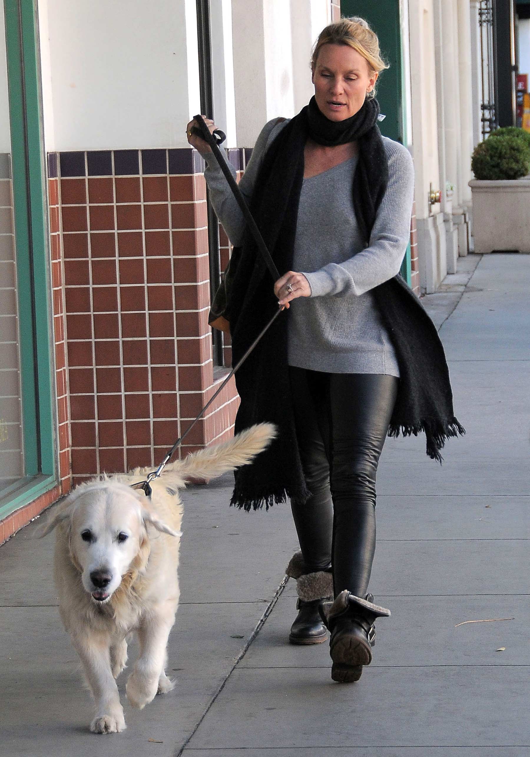 Nicollette Sheridan out with her dog in Beverly Hills