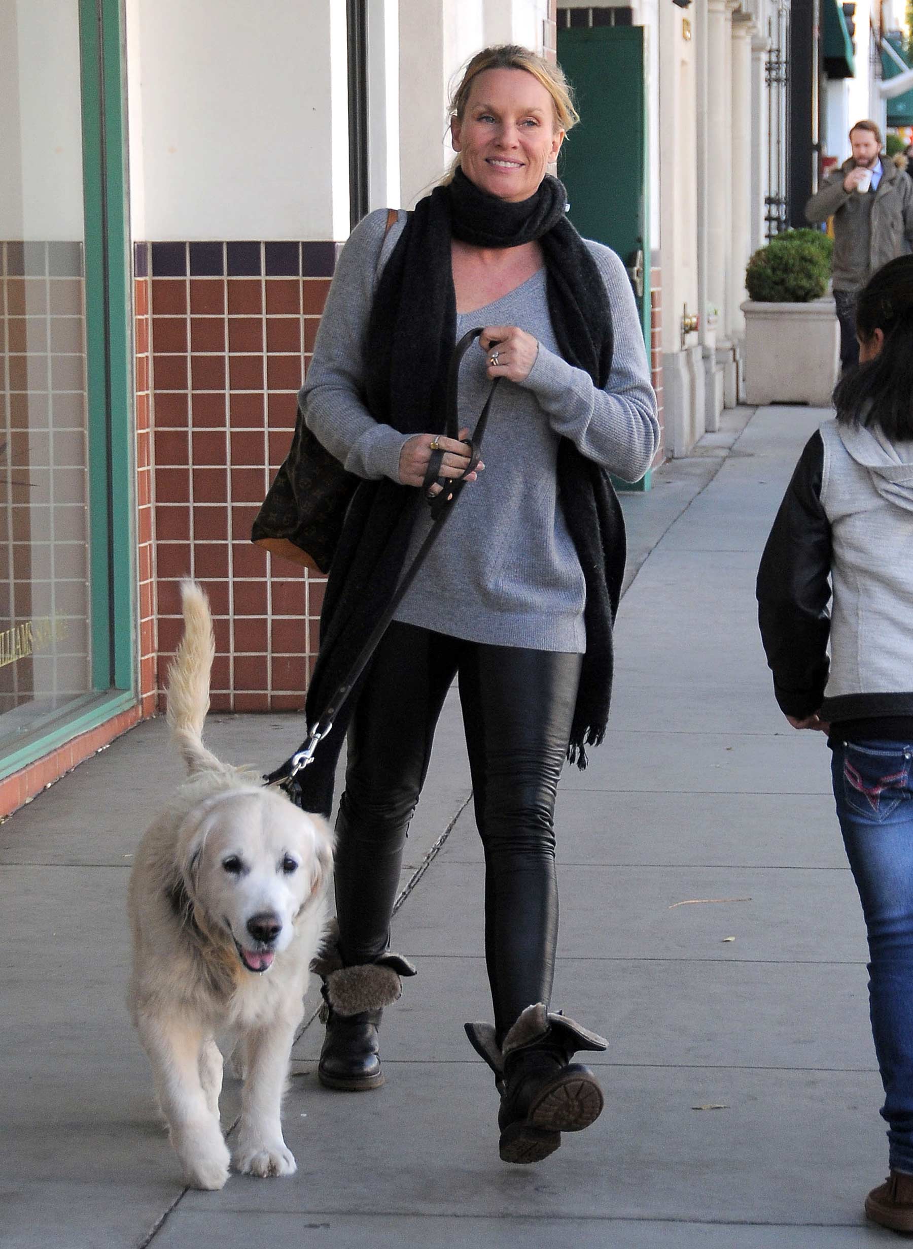 Nicollette Sheridan out with her dog in Beverly Hills