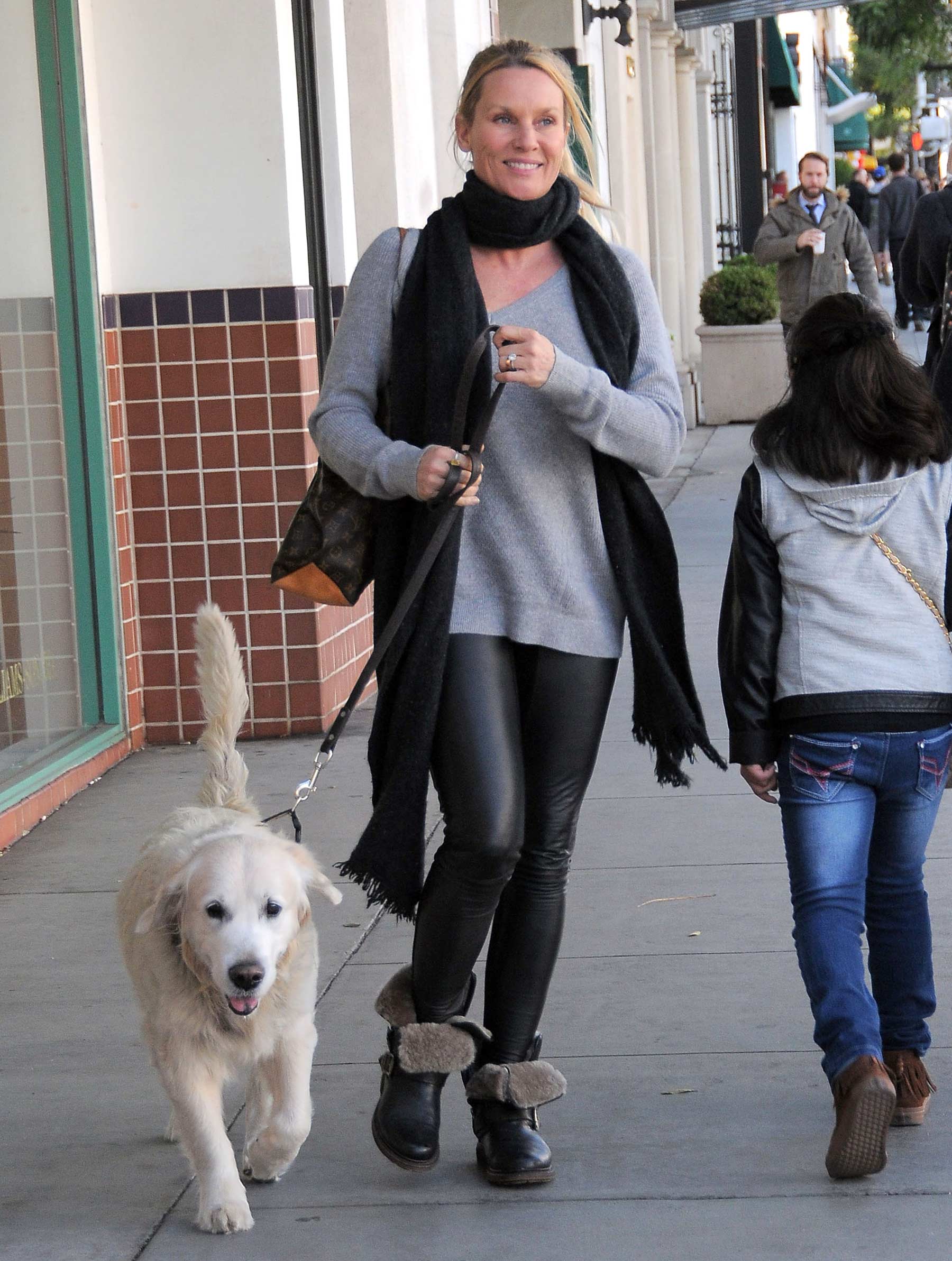 Nicollette Sheridan out with her dog in Beverly Hills