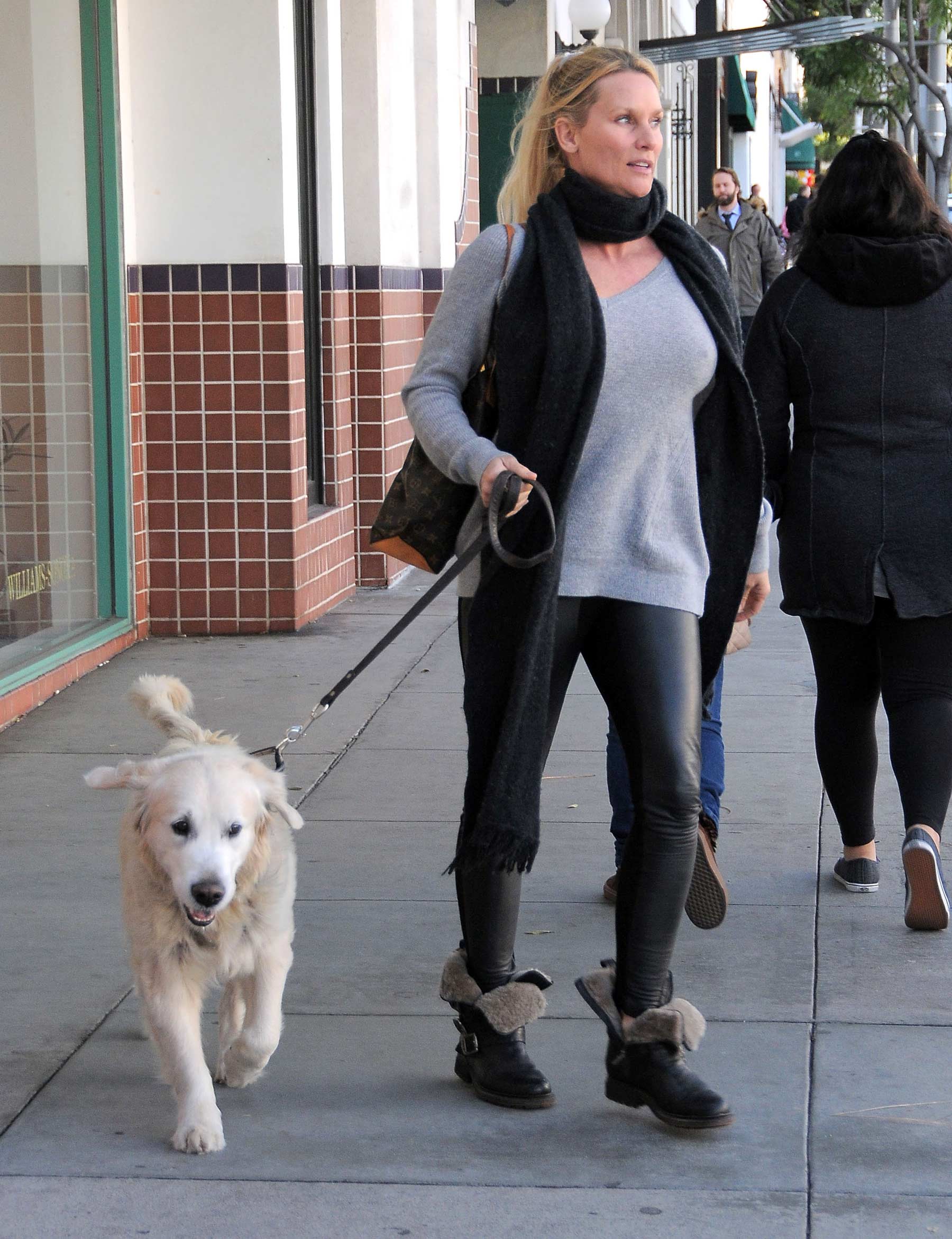 Nicollette Sheridan out with her dog in Beverly Hills