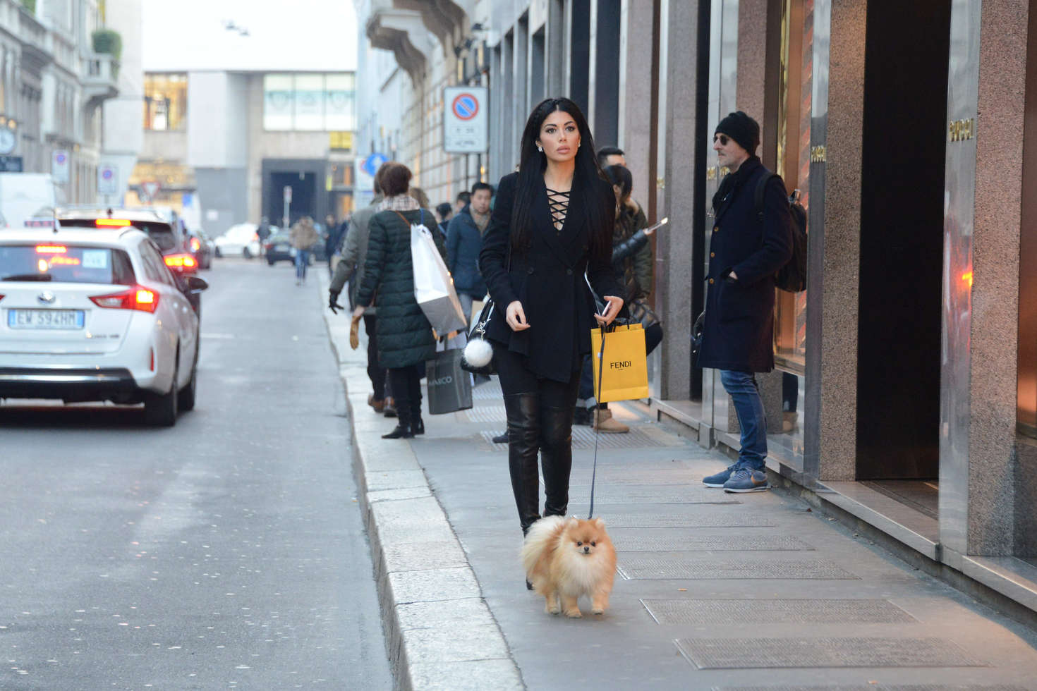 Alessandra Sorcinelli walking her dog